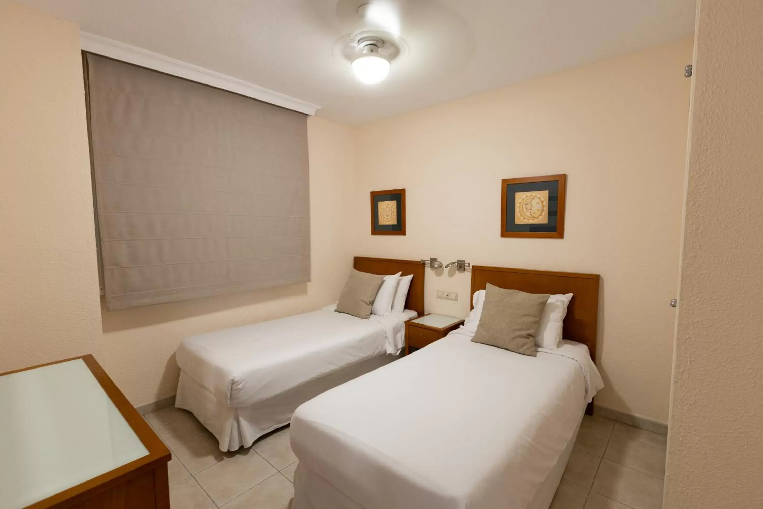 Bed in Ramada Hotel & Suites by Wyndham Costa del Sol