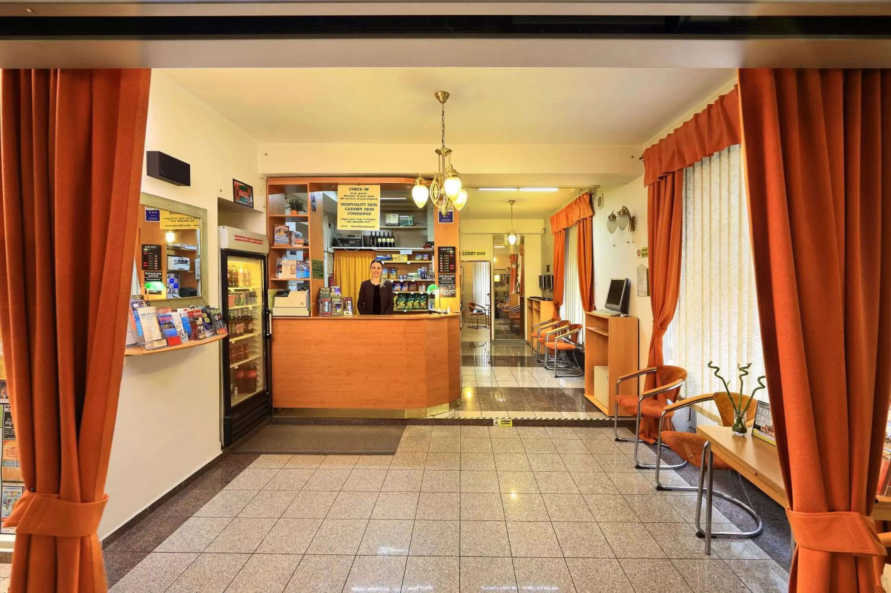 Lobby or reception in Hotel Golden City Garni