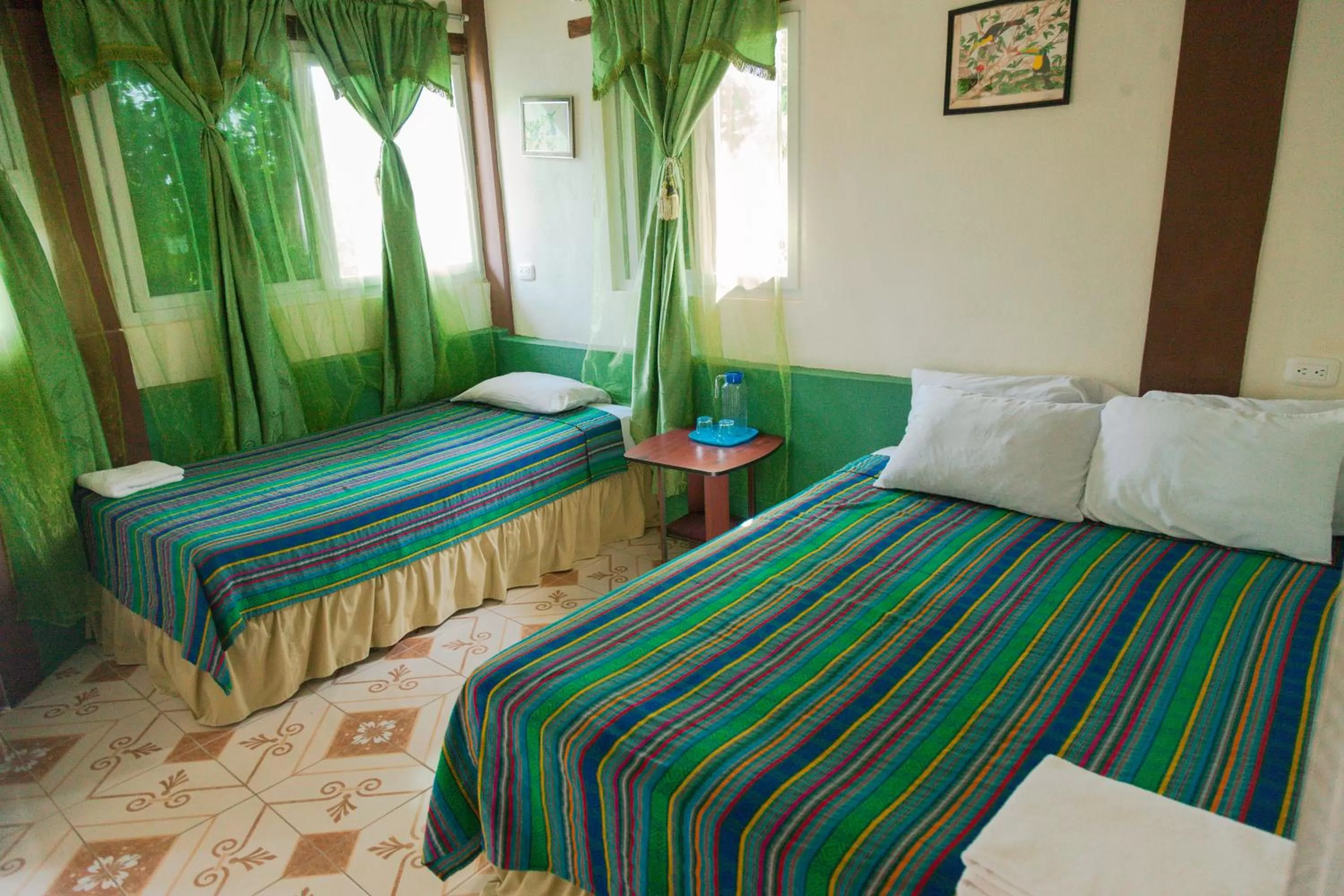 Bed in Zapote Tree Inn