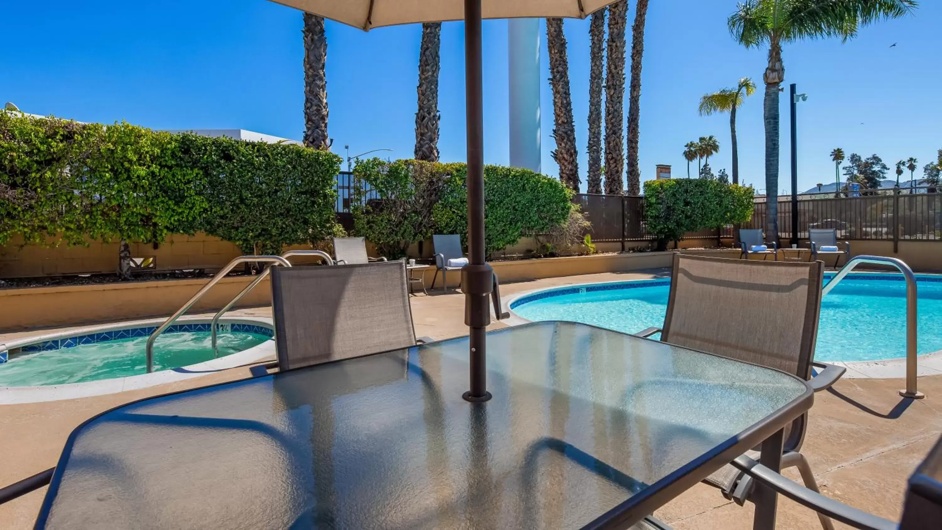 Swimming Pool in SureStay Plus Hotel by Best Western San Bernardino South