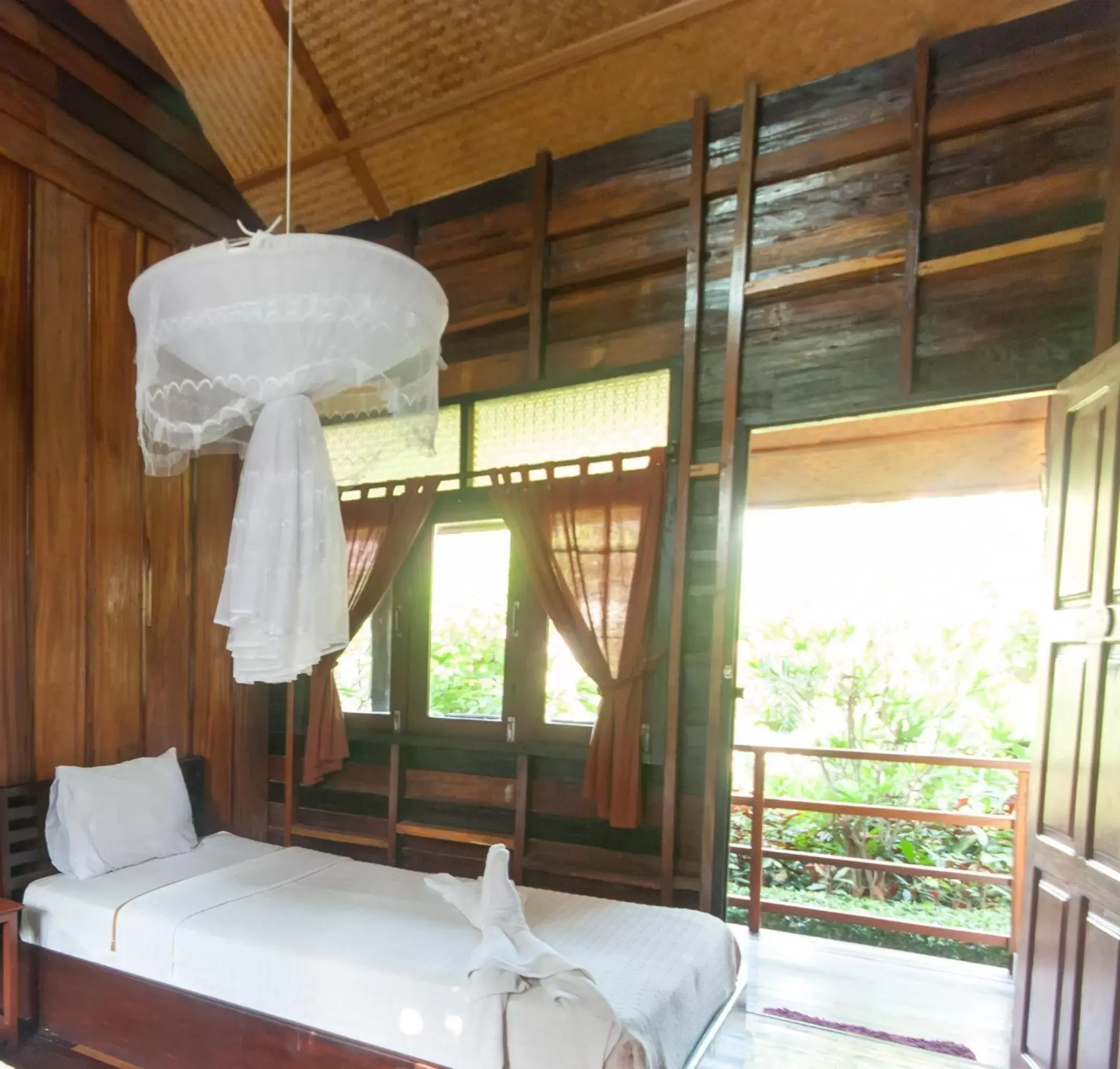 Bed in Namkhong Guesthouse and Resort