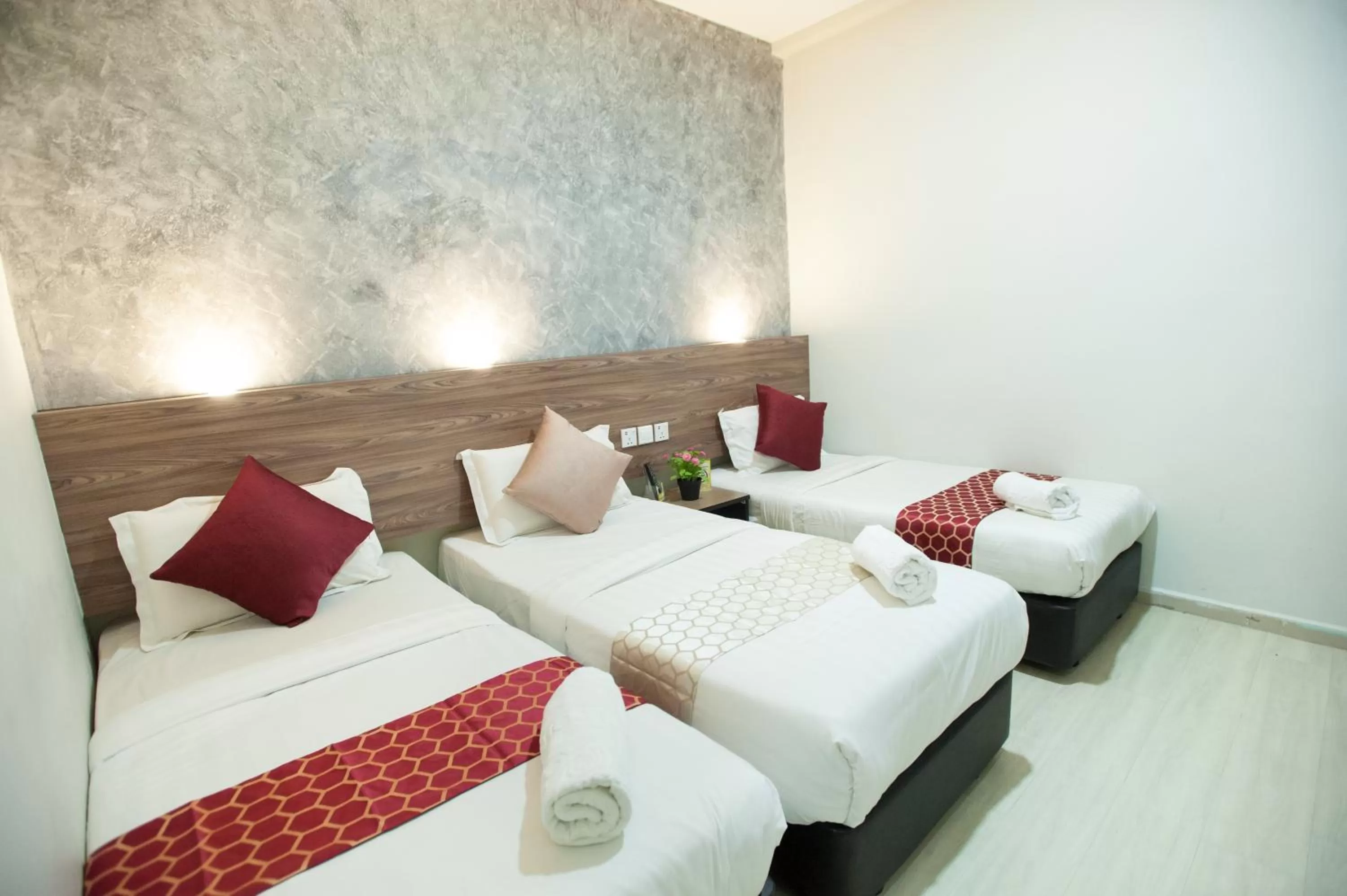 Bed in DJ Citi Point Hotel