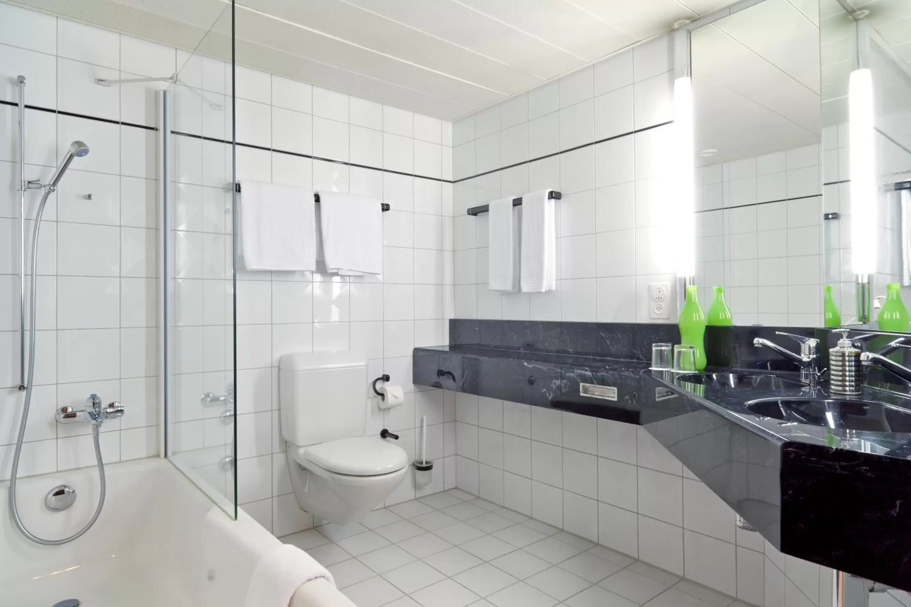 Bathroom in Ramada by Wyndham Baden Hotel du Parc
