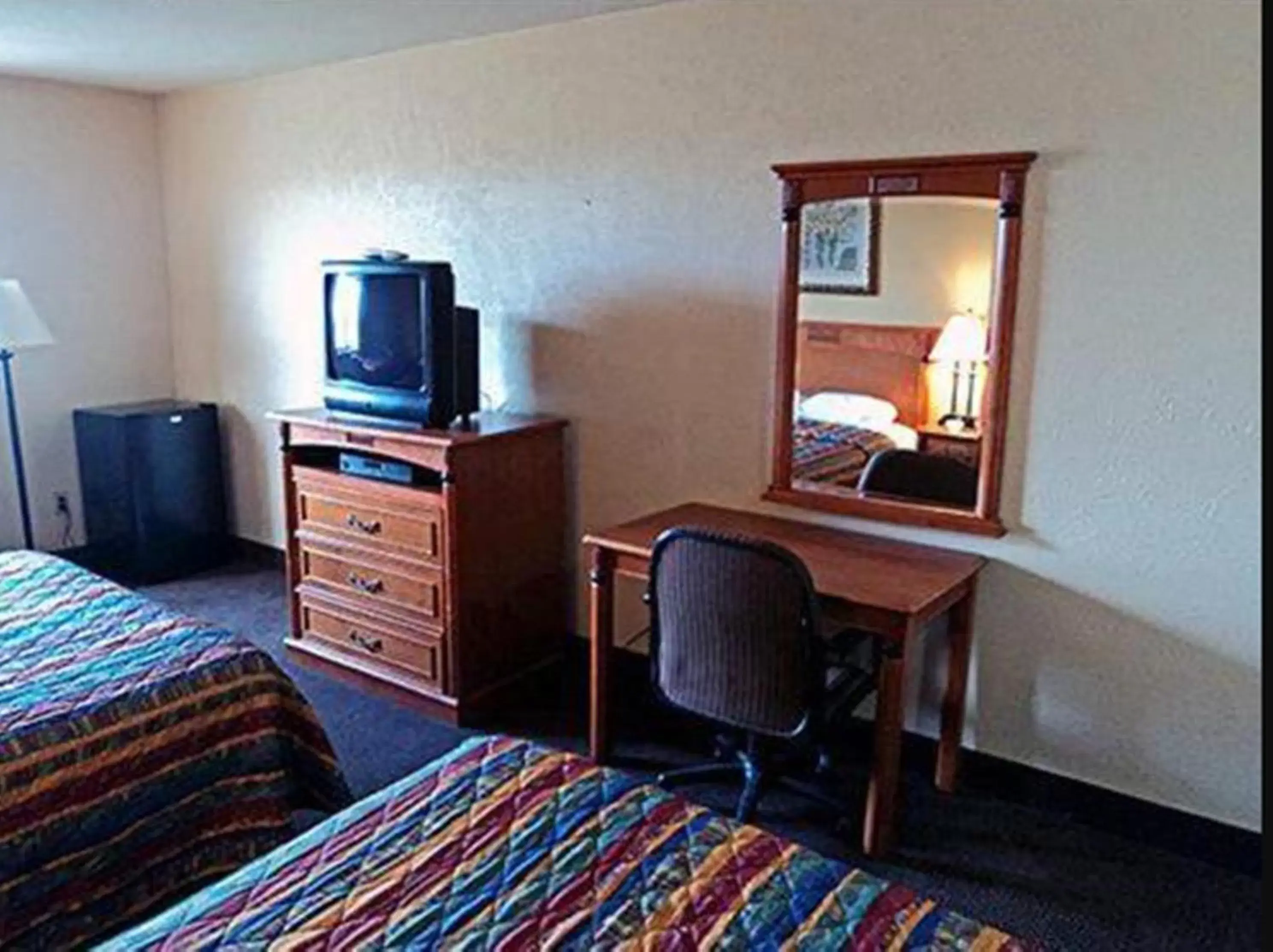 Bedroom, TV/Entertainment Center in Motel 6-Moriarty, NM