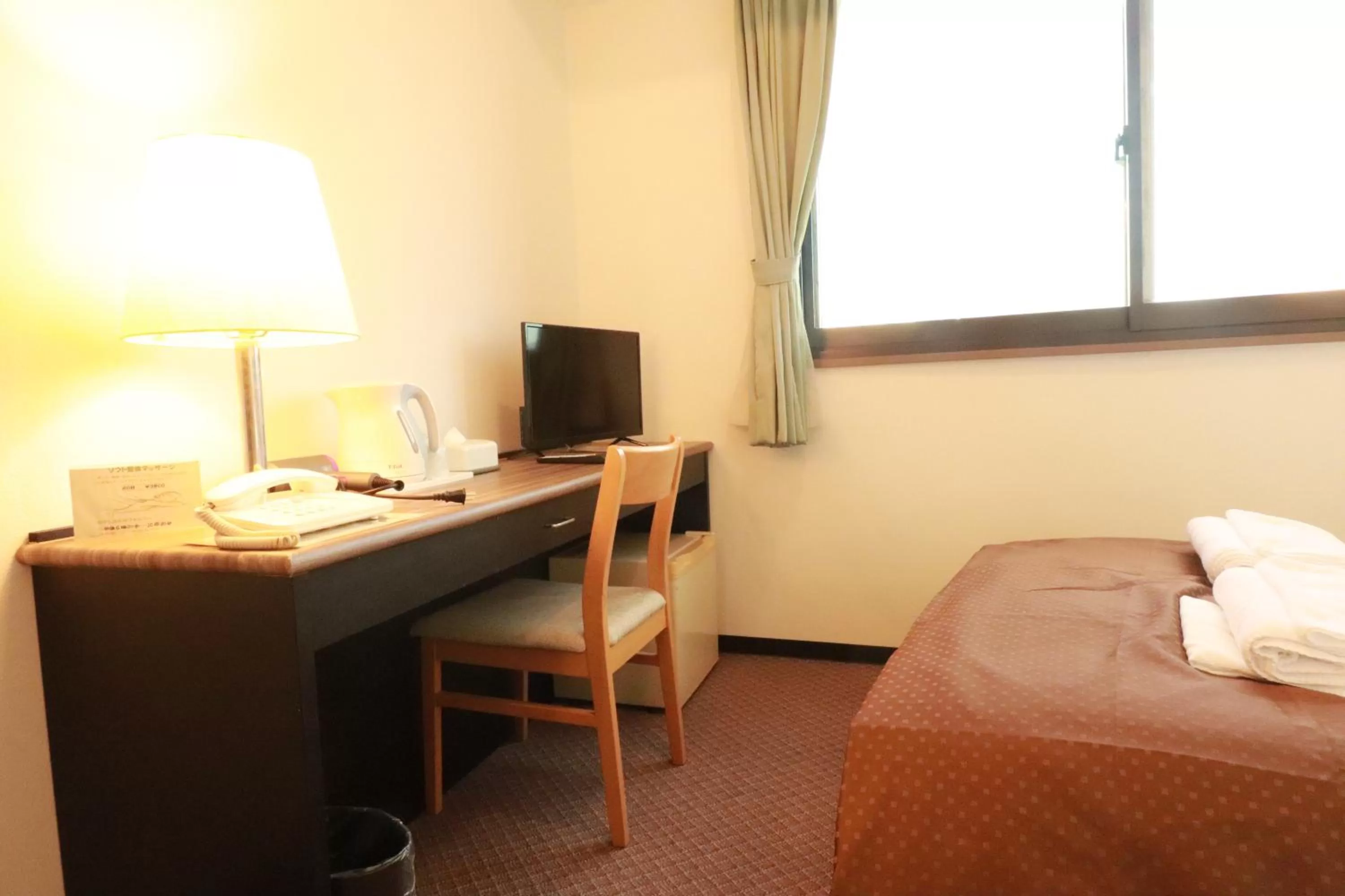 Photo of the whole room, Bed in Business Hotel Kudamatsu