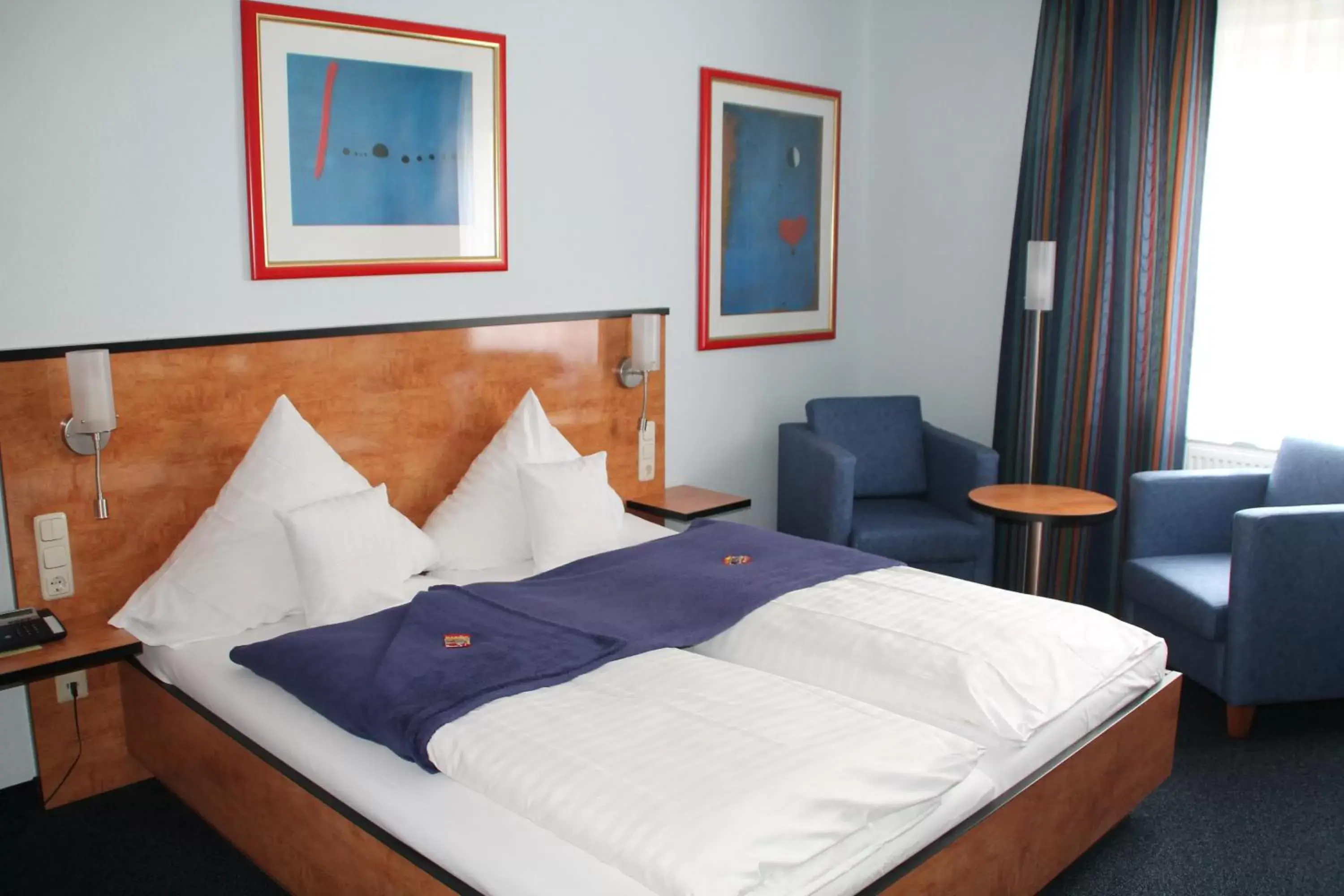 Photo of the whole room, Bed in Trip Inn Hotel Zum Riesen Hanau