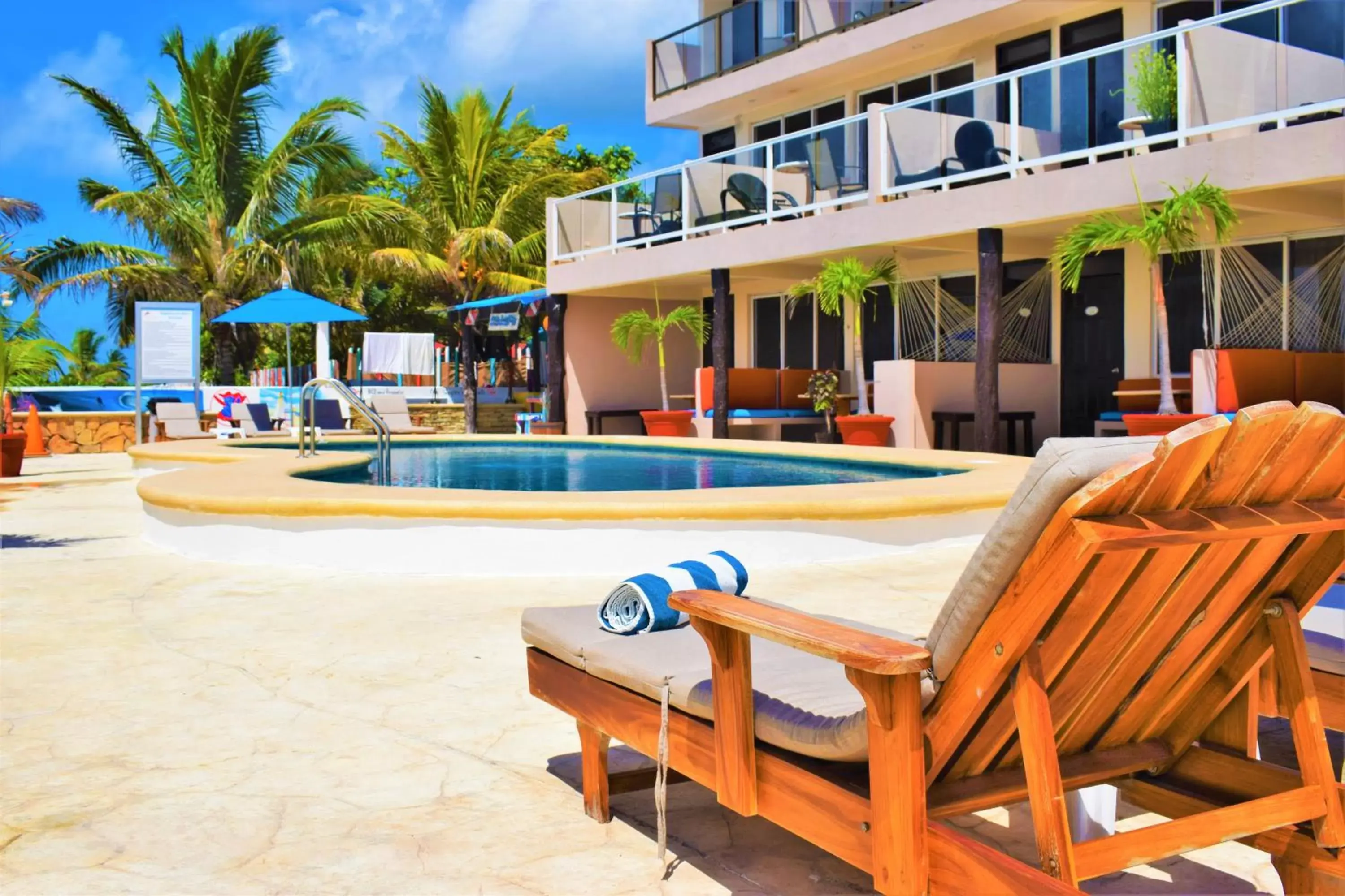 sunbed, Swimming Pool in Hacienda Morelos Beachfront Hotel