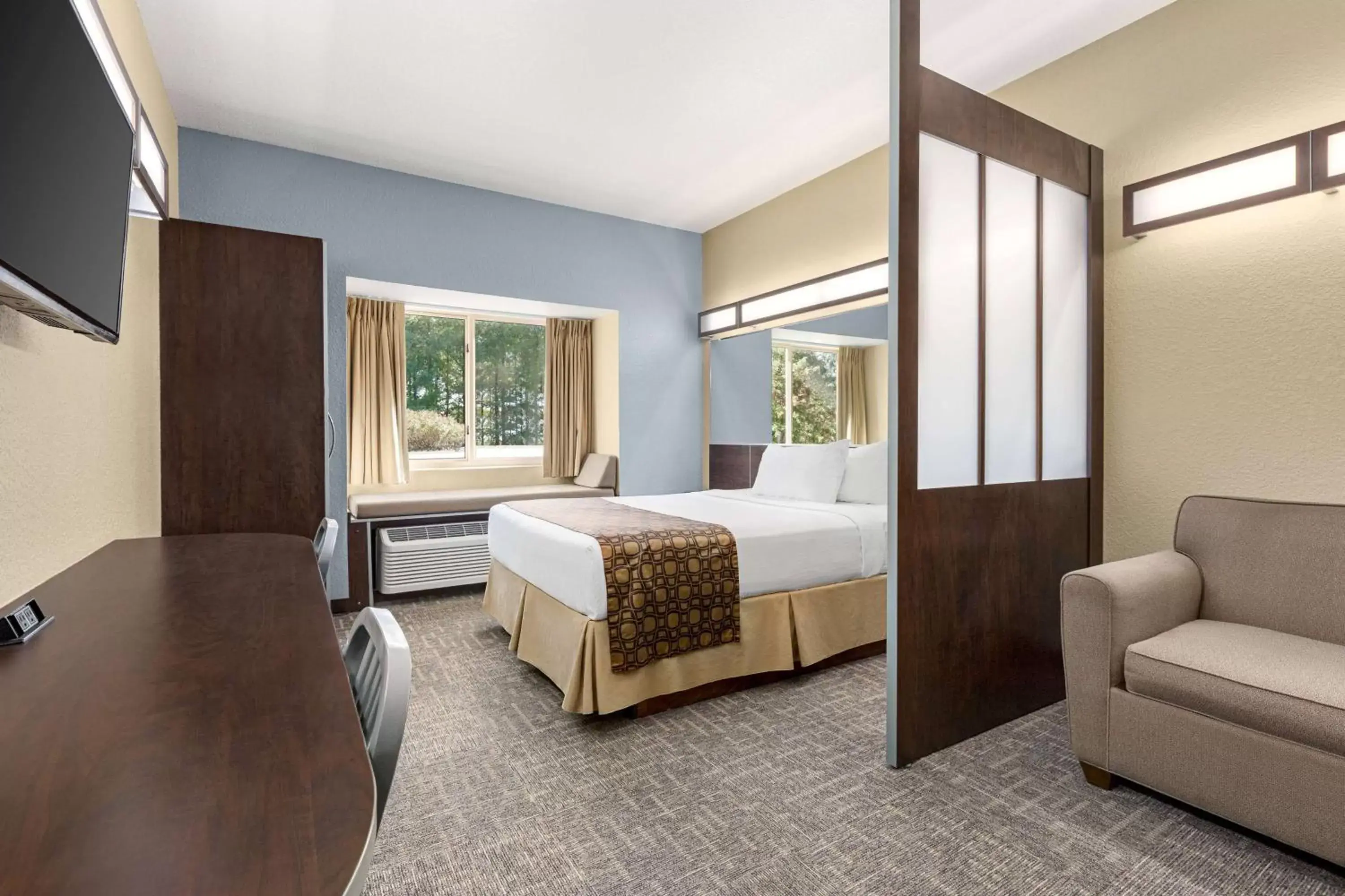 Bed in Microtel Inn & Suites by Wyndham Woodstock/Atlanta North