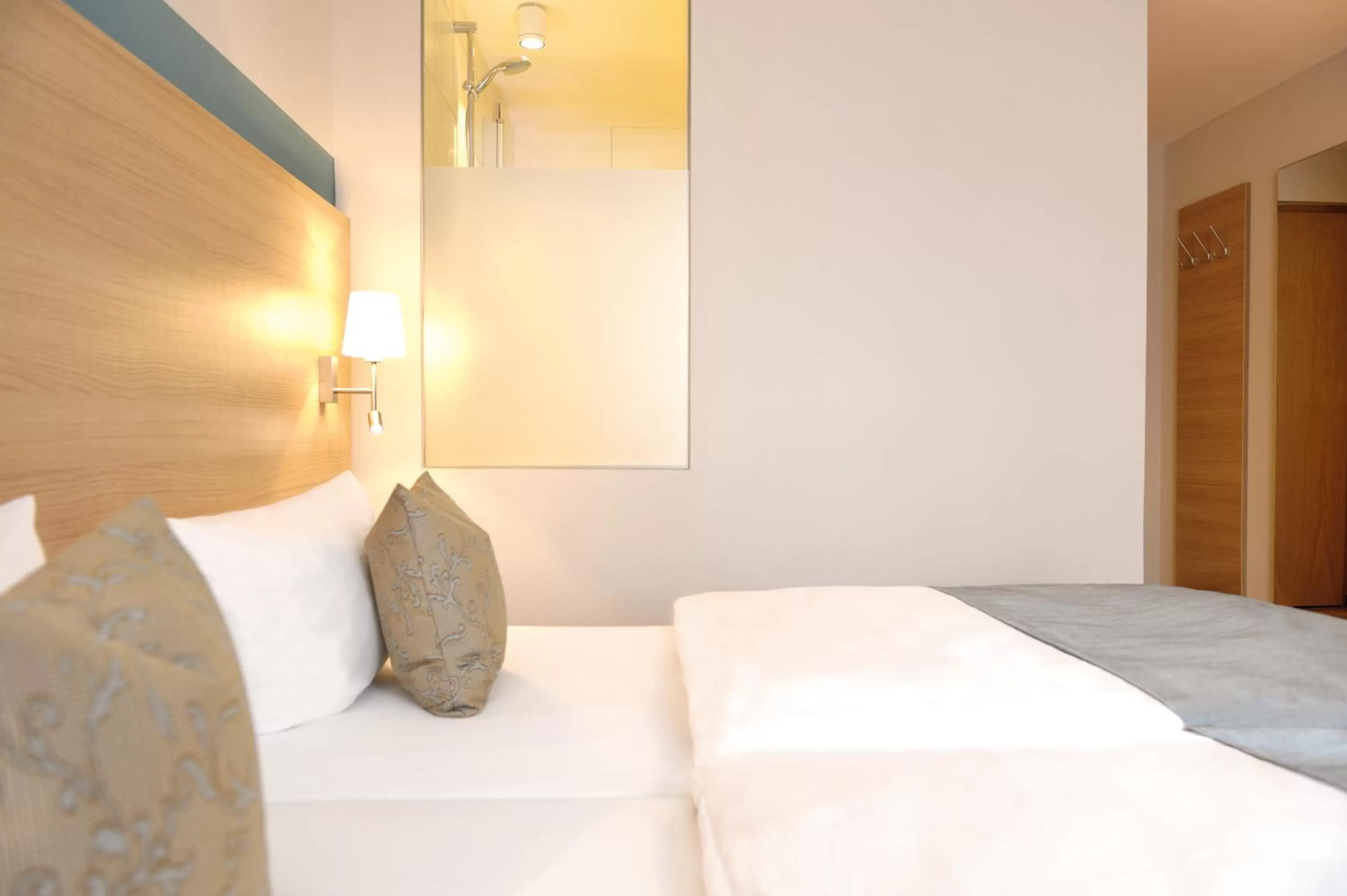 Photo of the whole room, Bed in Hotel & Gasthaus DAS RÖHRL Straubing