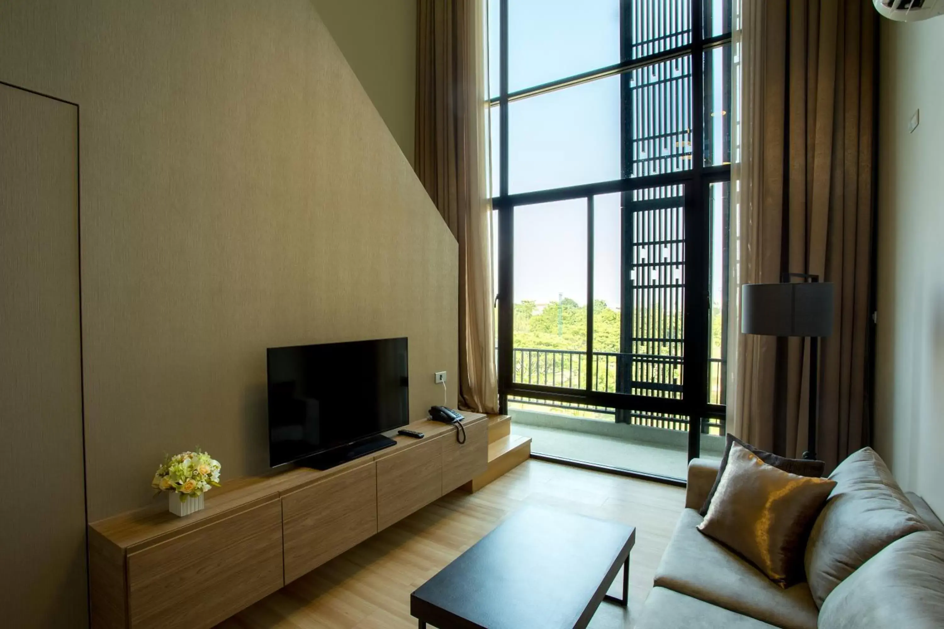 Communal lounge/ TV room, Seating Area in Hyde Park Chiangmai