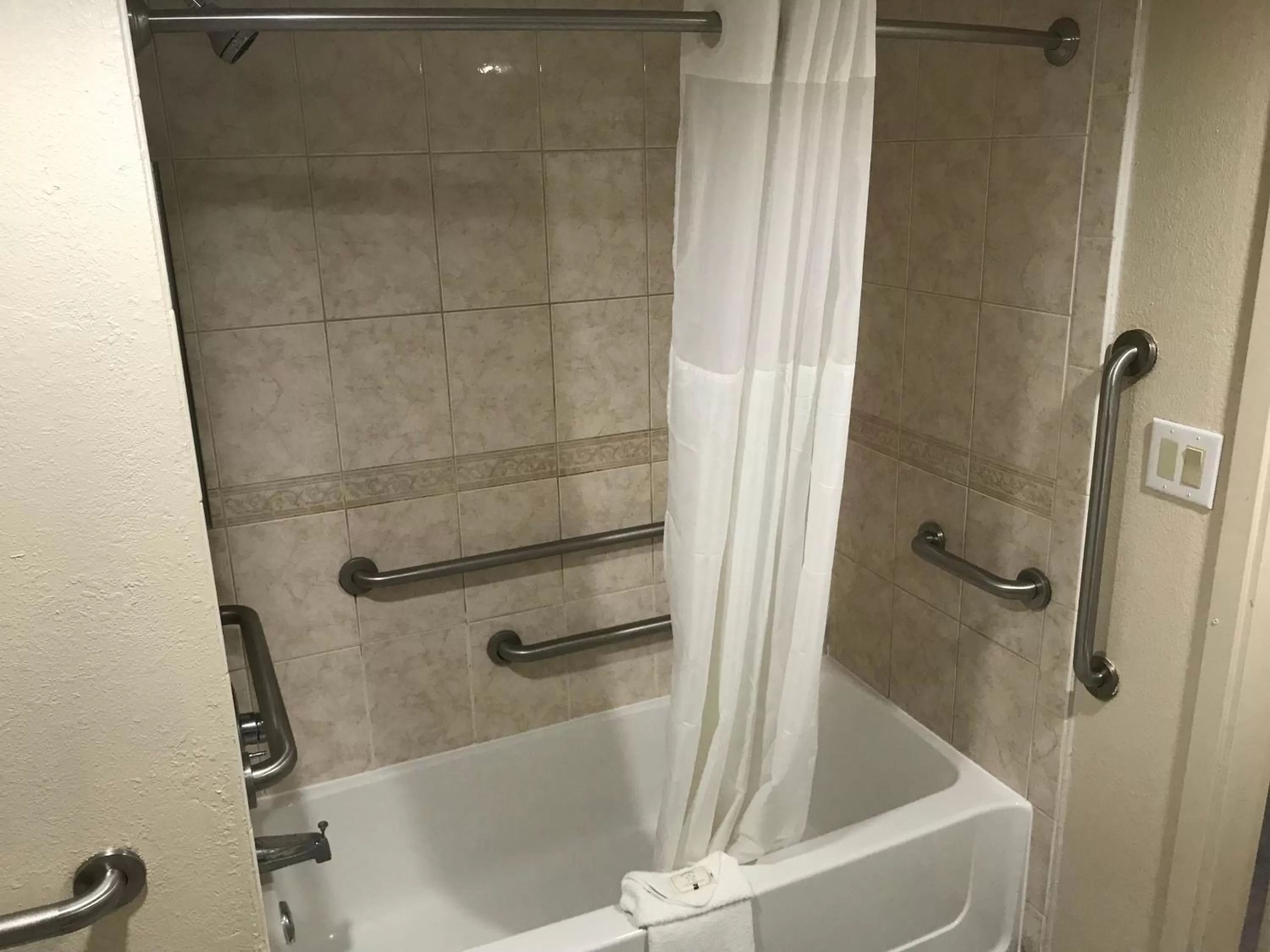 Shower in Quality Inn and Conference Center