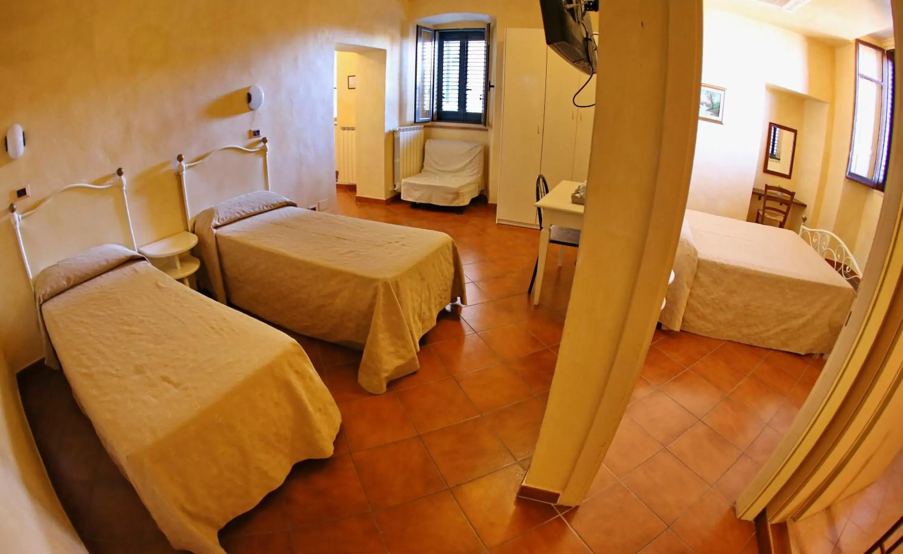 Photo of the whole room, Bed in Hotel Italia Cortona