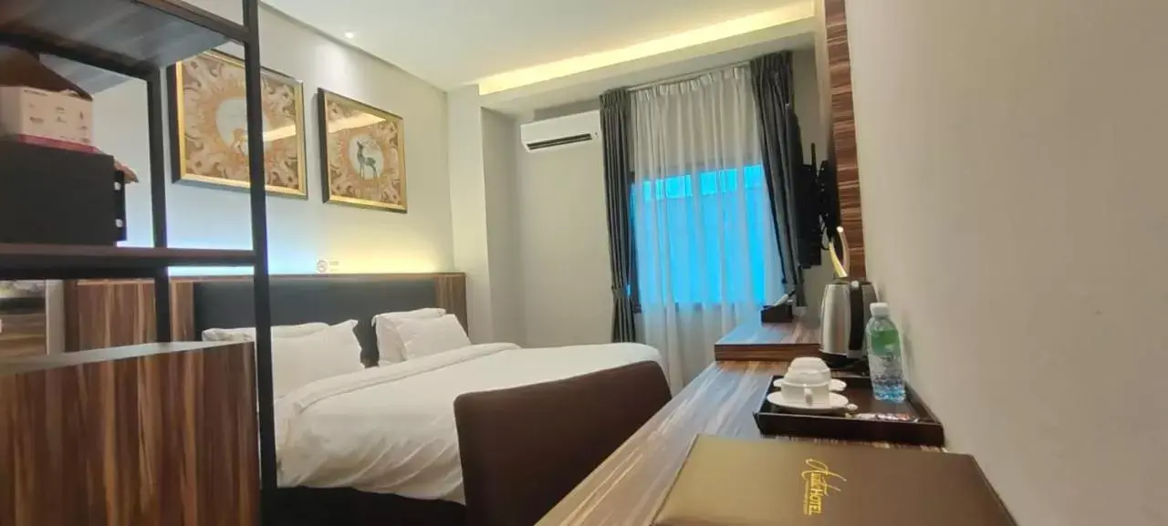 Bedroom in Asiatic Hotel