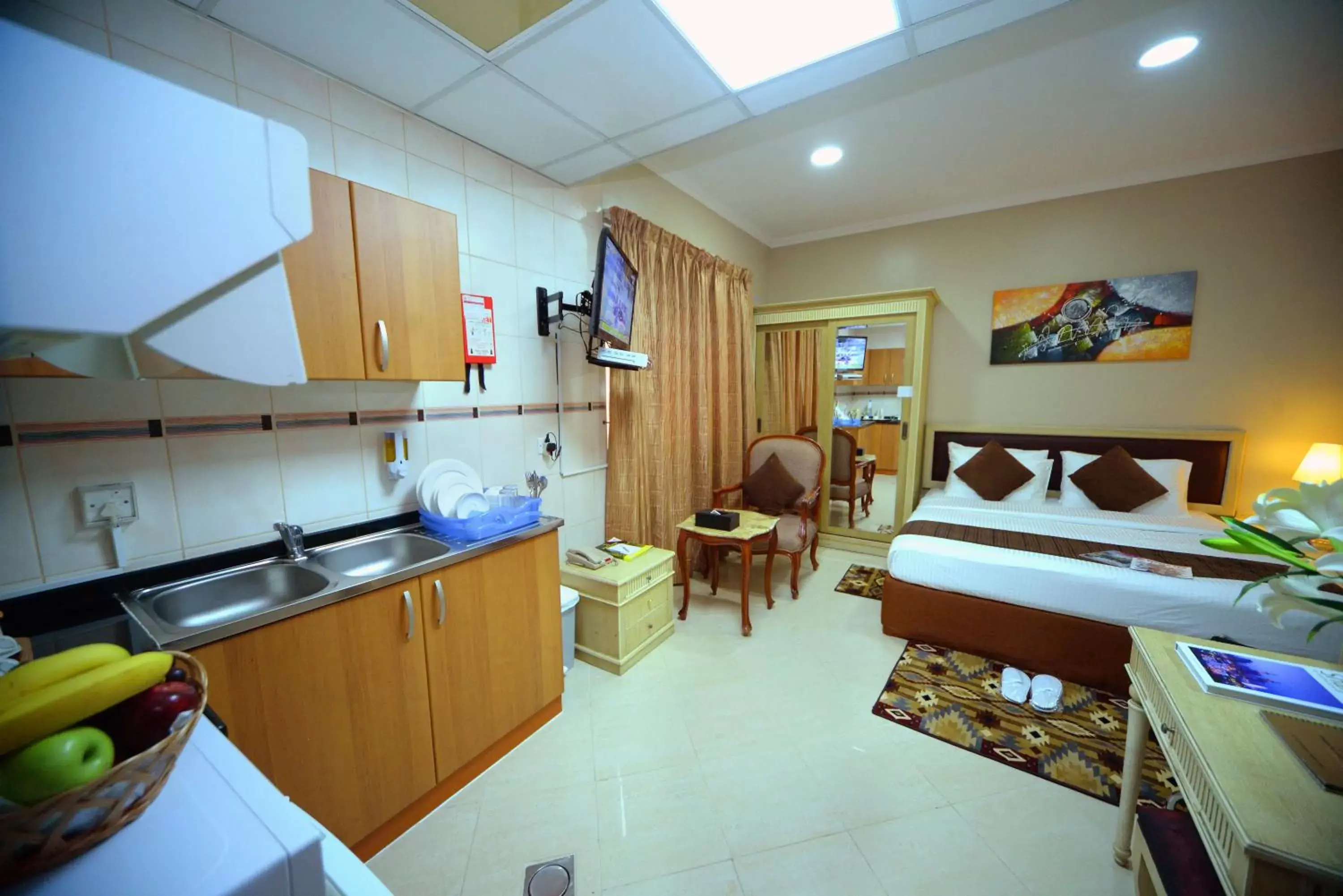 Photo of the whole room, Kitchen/Kitchenette in Emirates Stars Hotel Apartments Sharjah