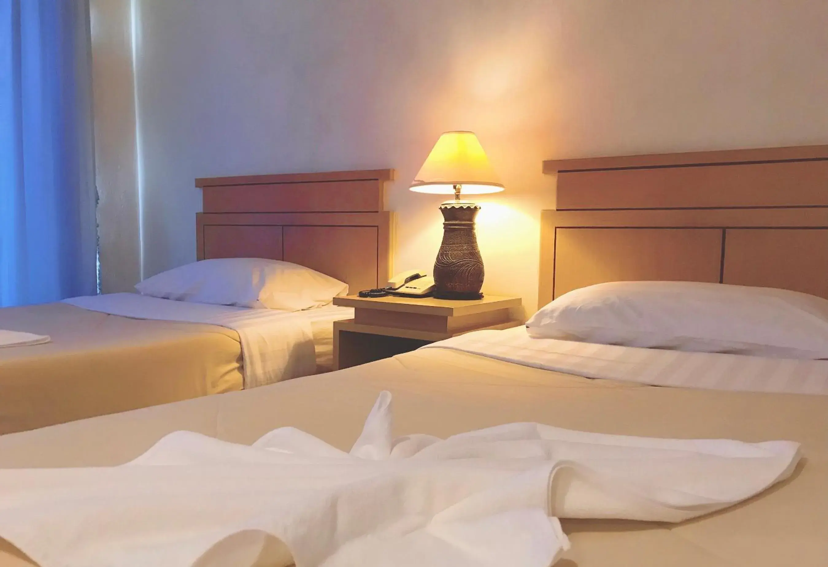 Bed in Maneerote Hotel Surin