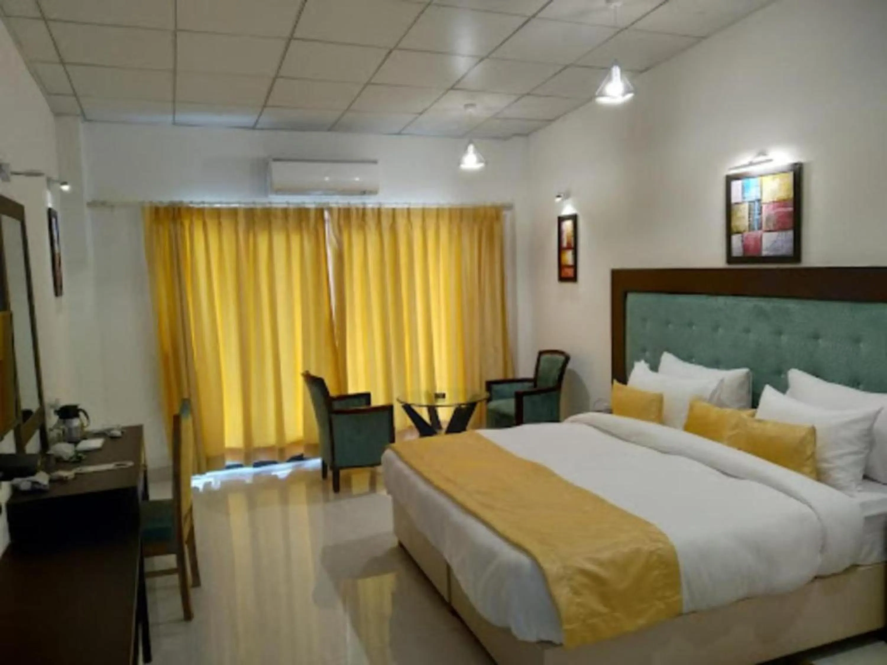 Bed in Goroomgo Assi River Guest House Varanasi