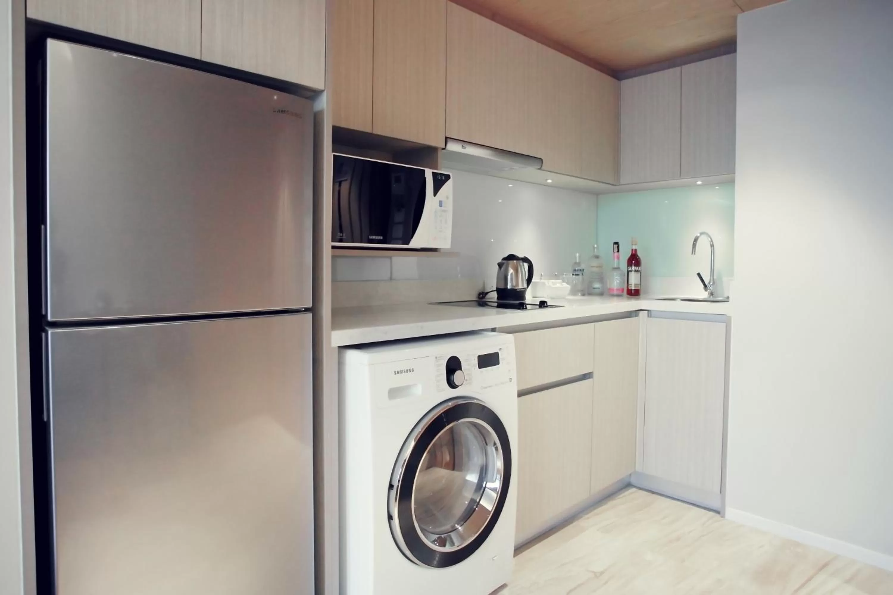 Kitchen or kitchenette in Arcadia Suites Bangkok