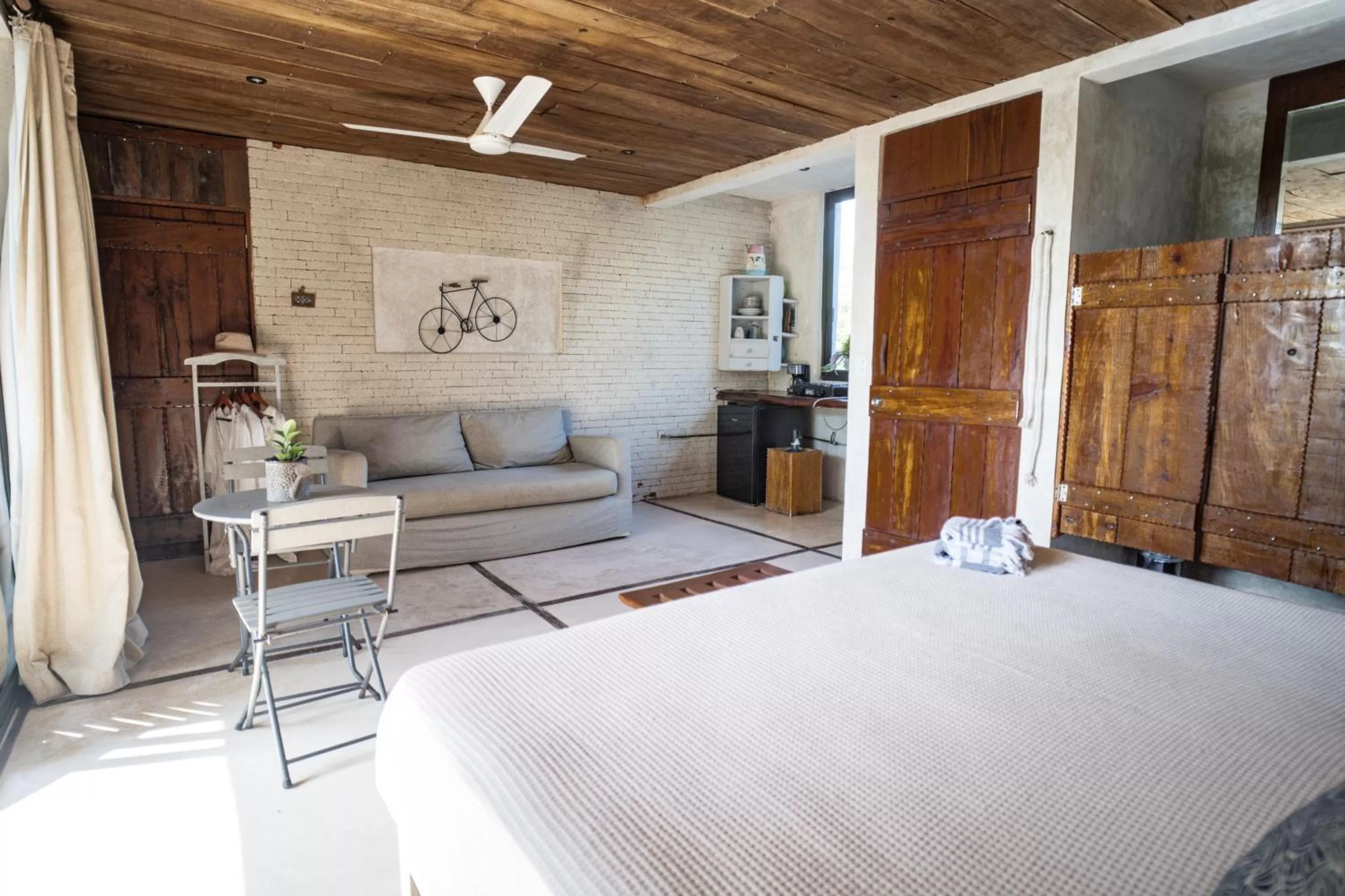 Living room, Bed in Suites Tulum