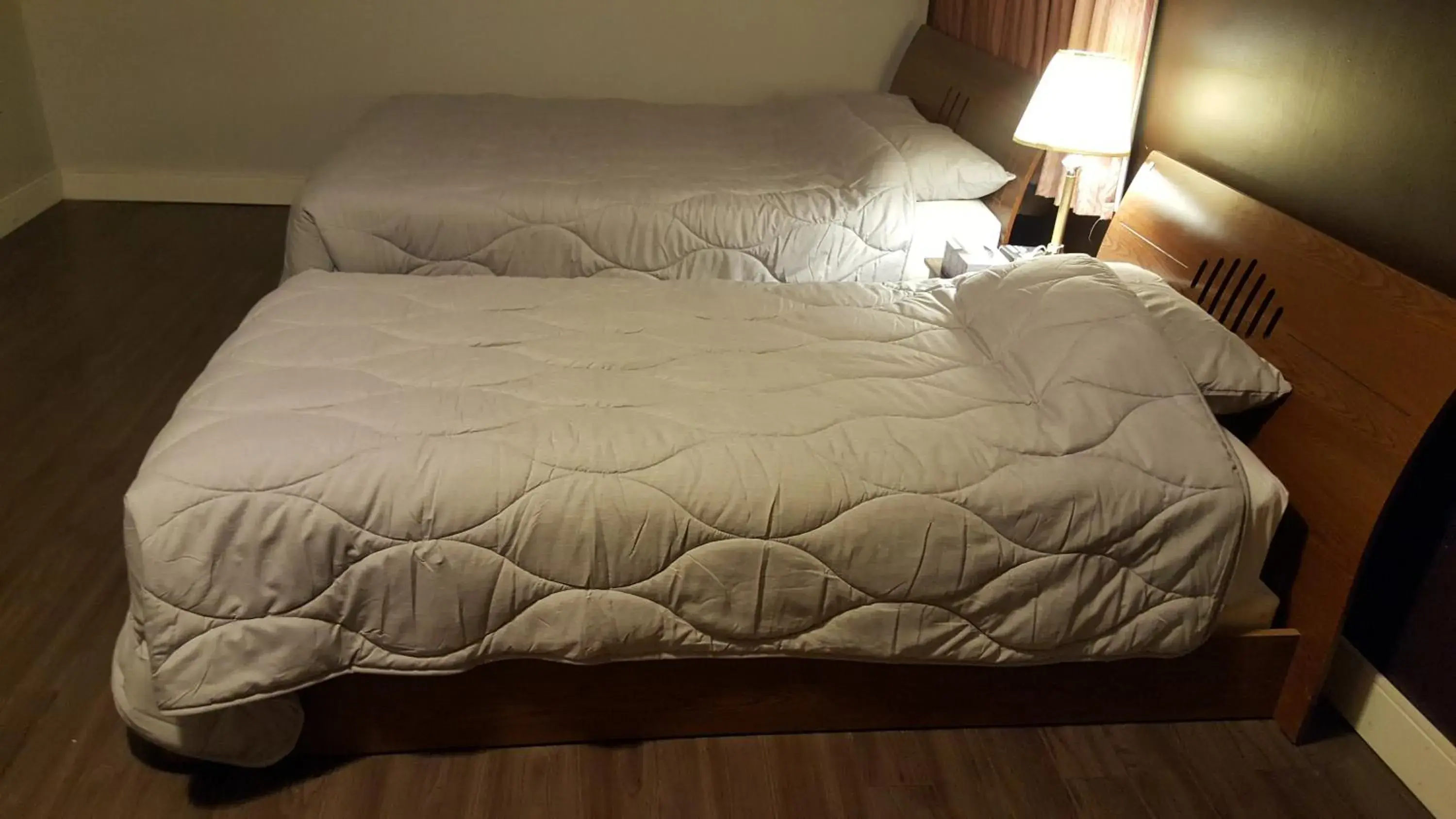 Bed in Centennial Motel