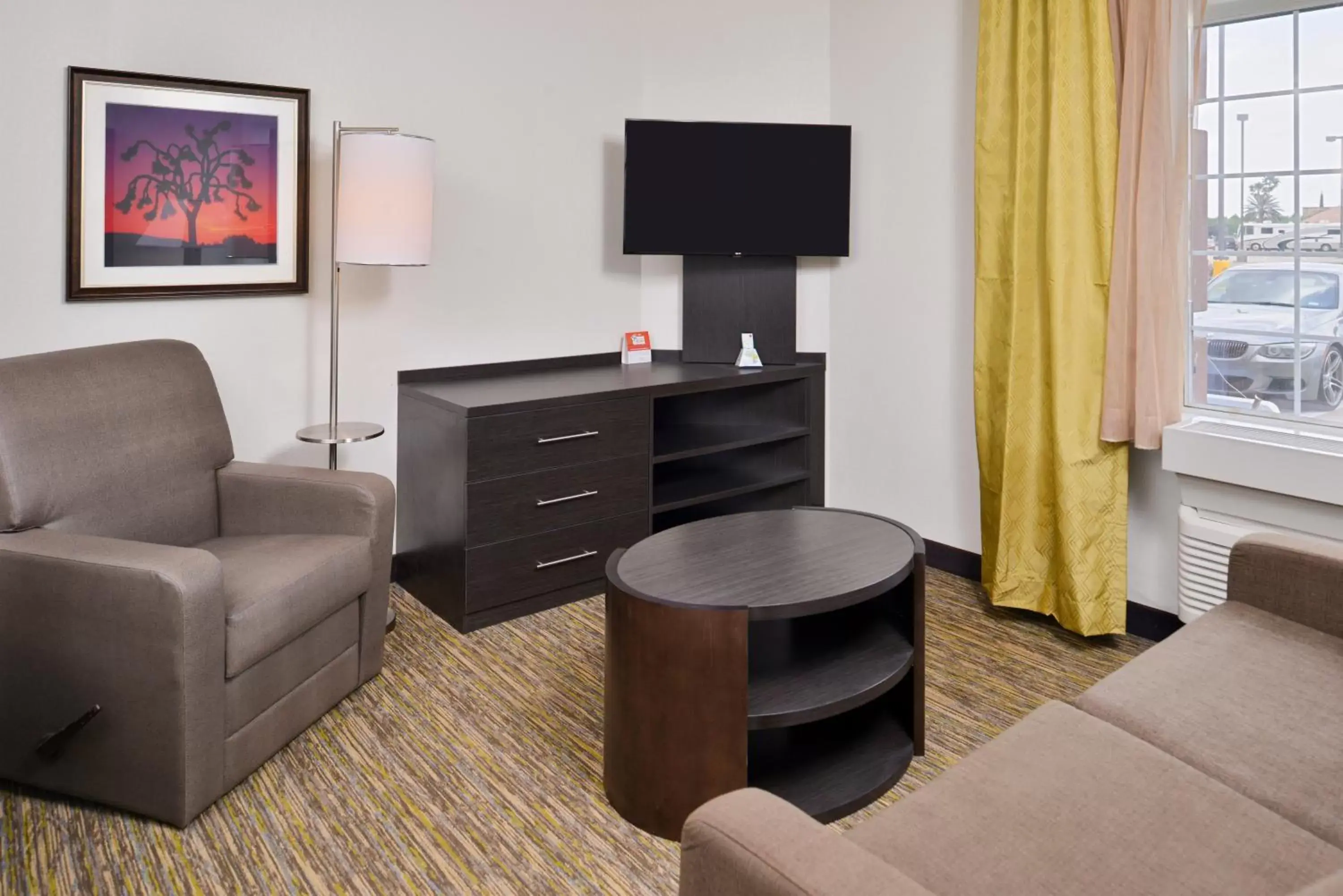 Photo of the whole room, TV/Entertainment Center in Candlewood Suites Beaumont, an IHG Hotel