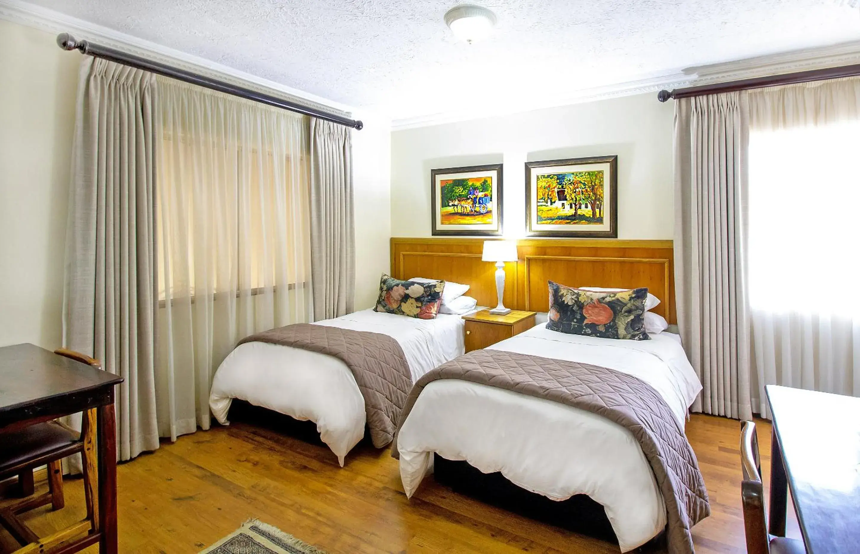 Bed in Sunward Park Guest House & Conference Center