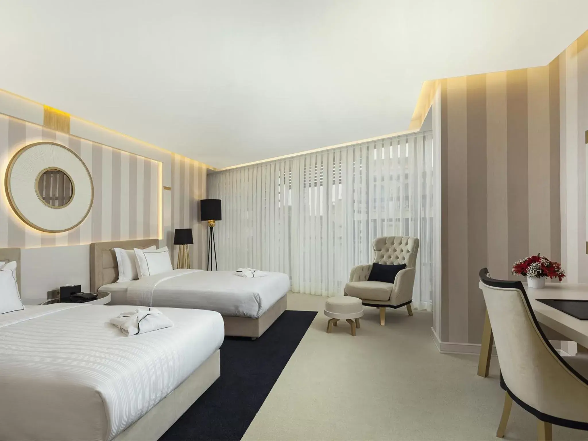 Family Suite with One Double Bed and Twin Beds in Ramada Hotel & Suites by Wyndham Istanbul- Sisli