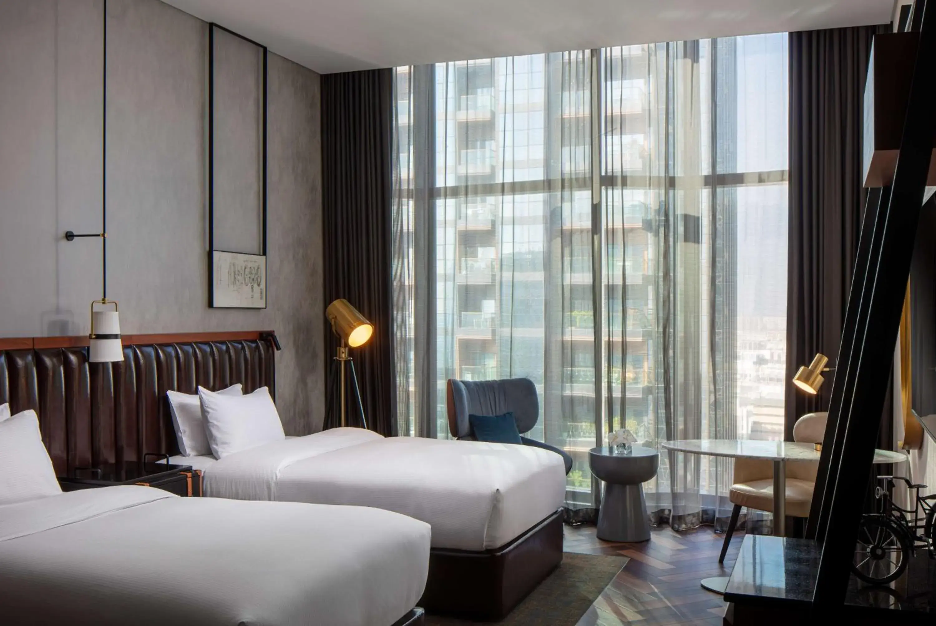 View (from property/room), Bed in DoubleTree by Hilton Dubai M Square Hotel & Residences