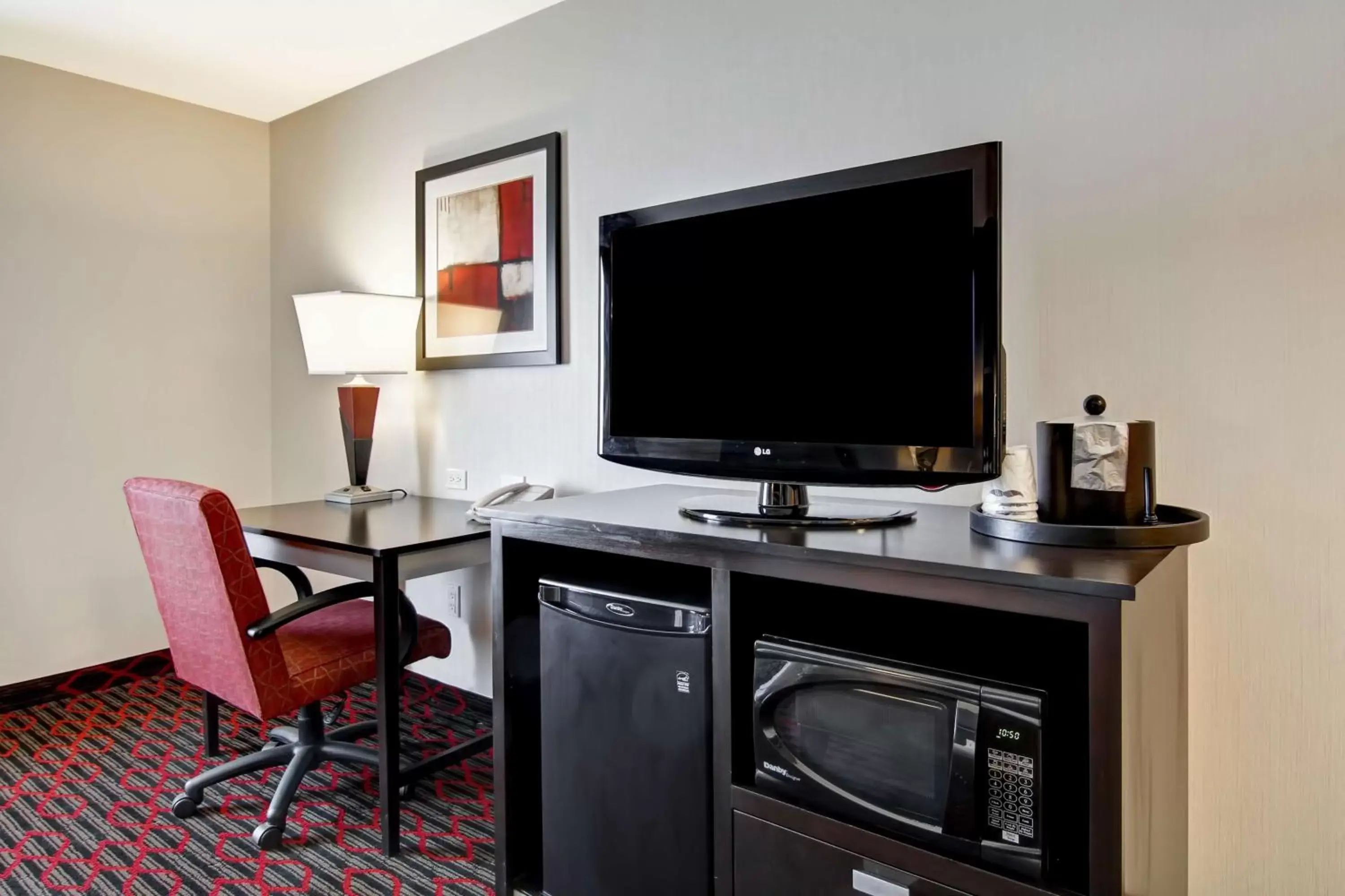 Bed, TV/Entertainment Center in Hampton Inn & Suites Red Deer