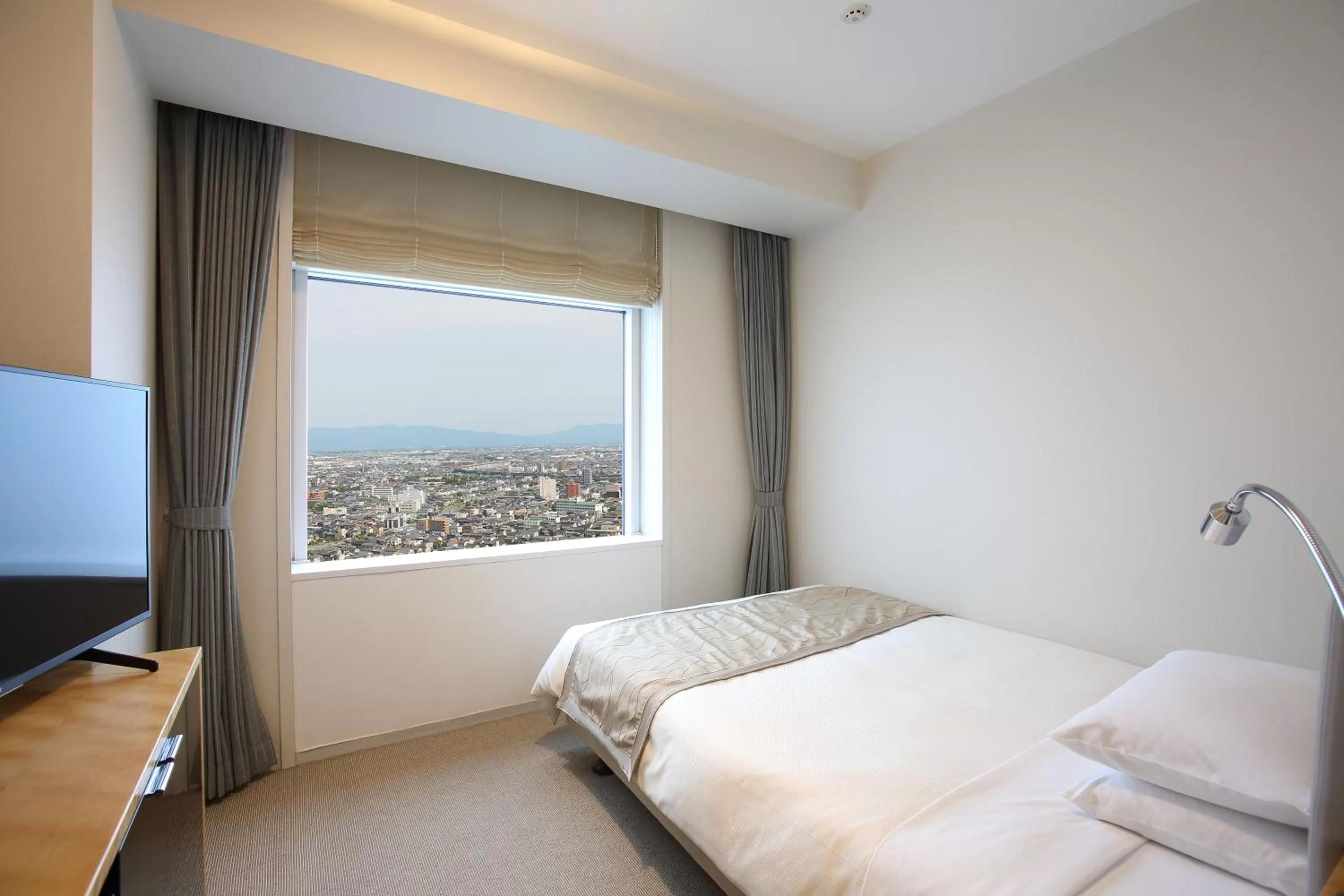 Bed in Hotel Nikko Niigata