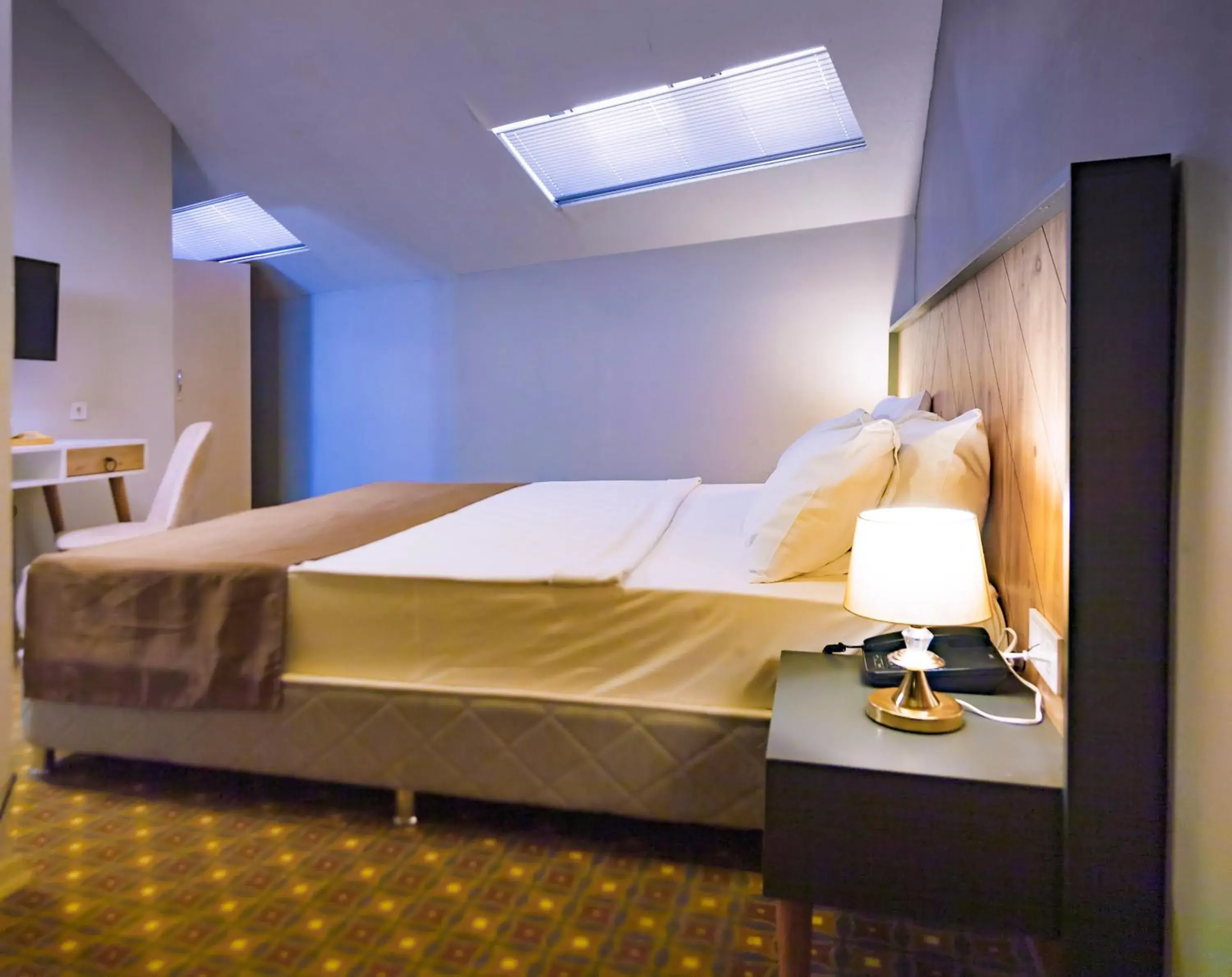 Bed in Privado Hotels