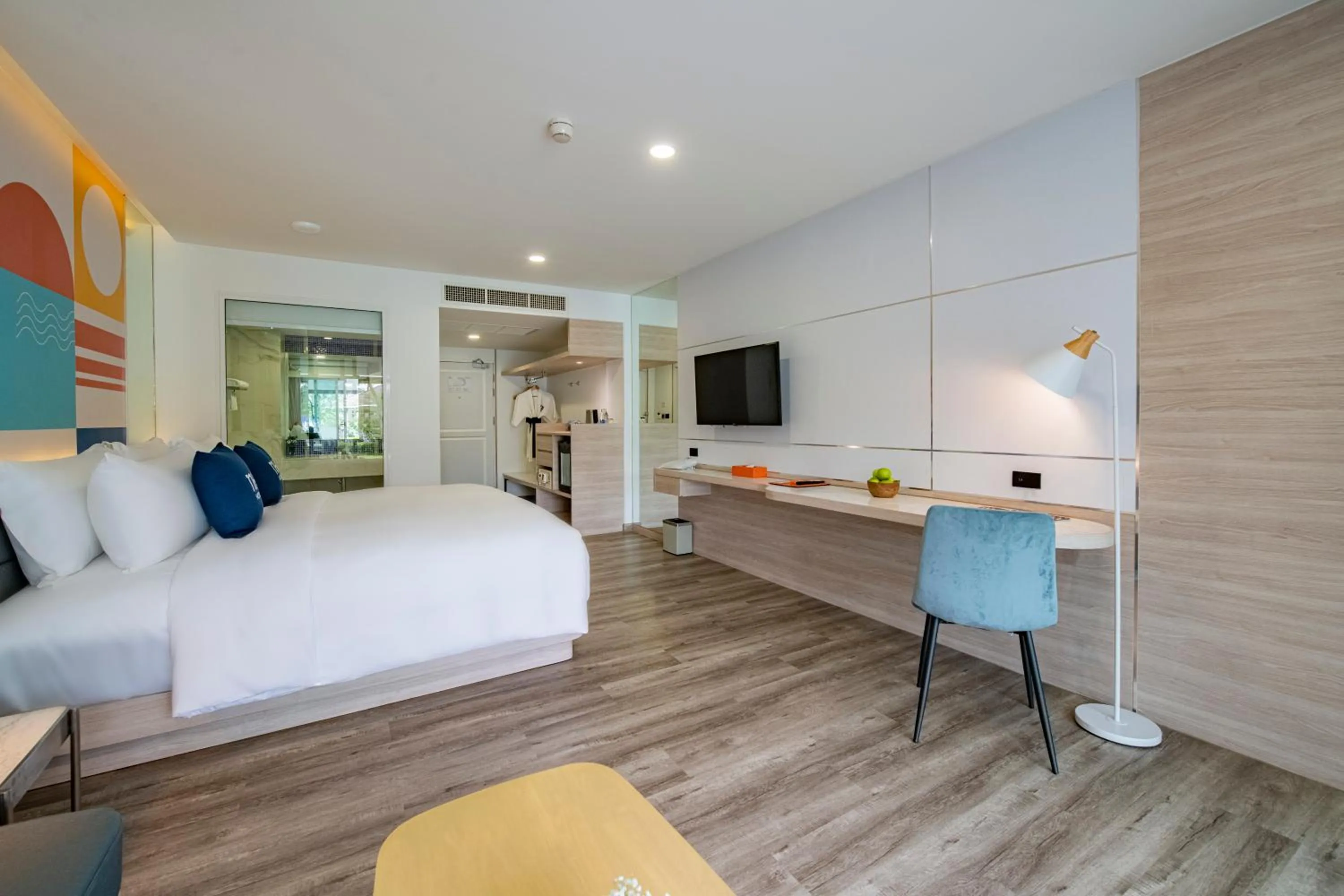 Bed in NH Boat Lagoon Phuket Resort