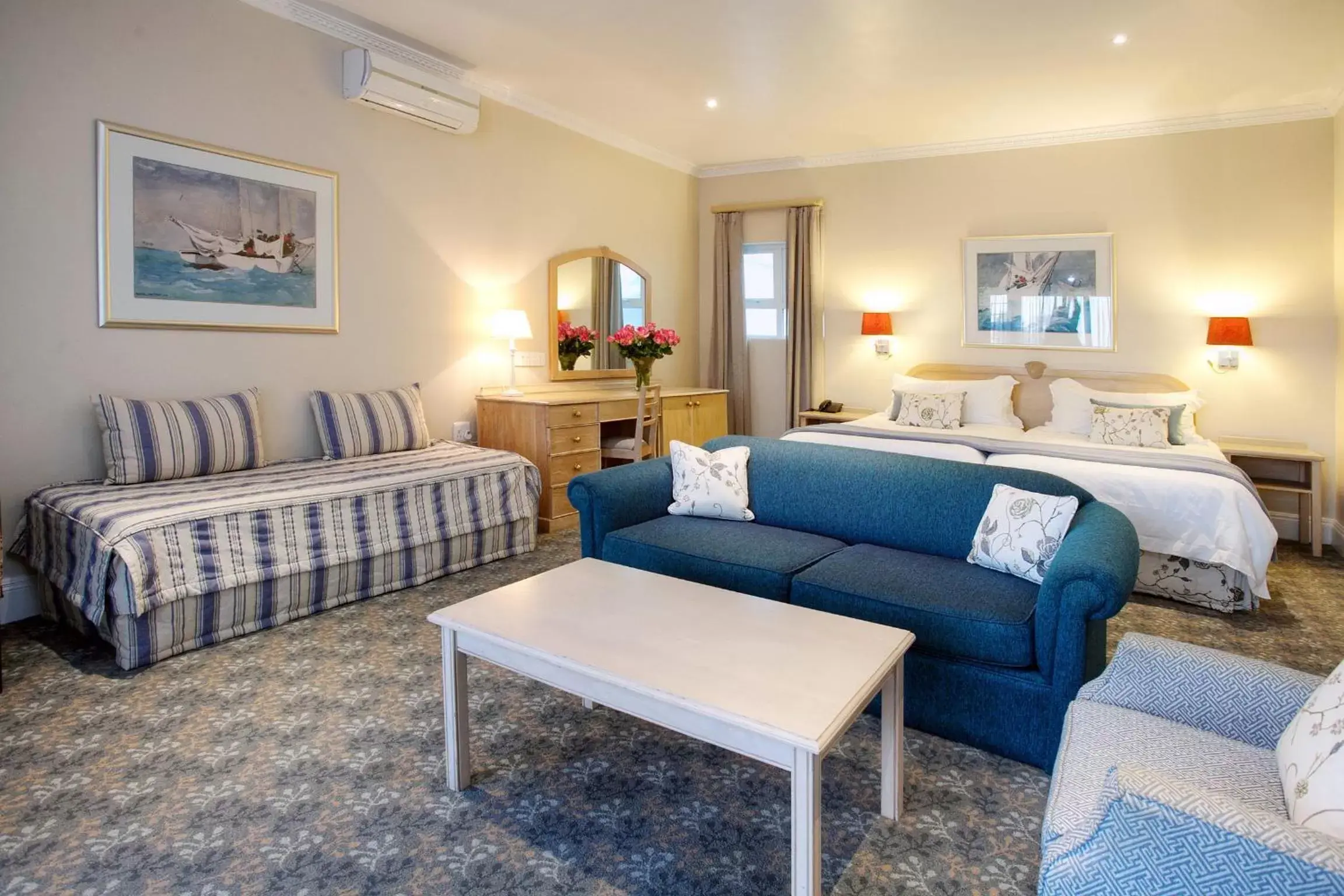 Bed, Seating Area in The Beach Hotel