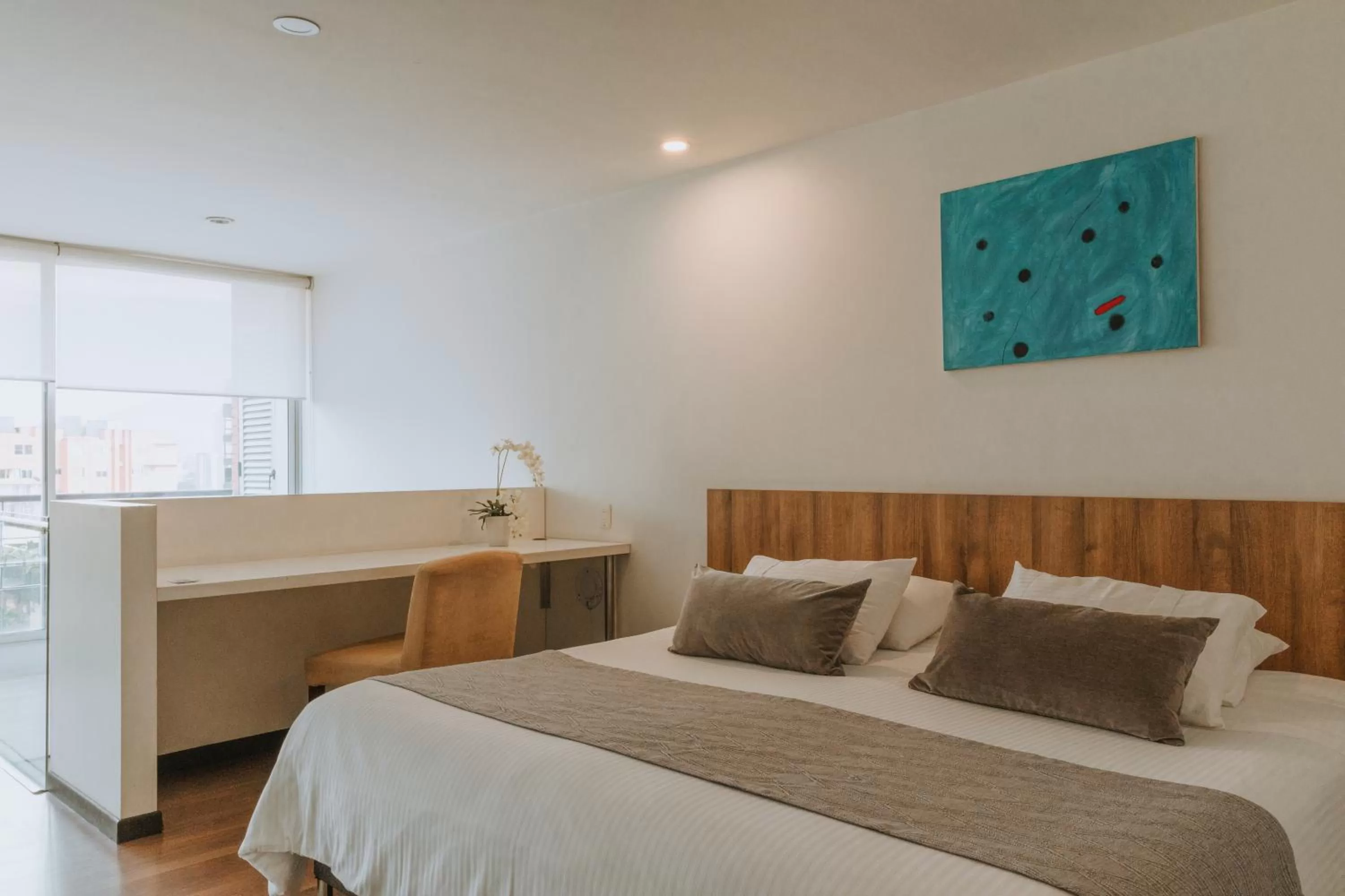 Photo of the whole room, Bed in Travelers Orange Suites