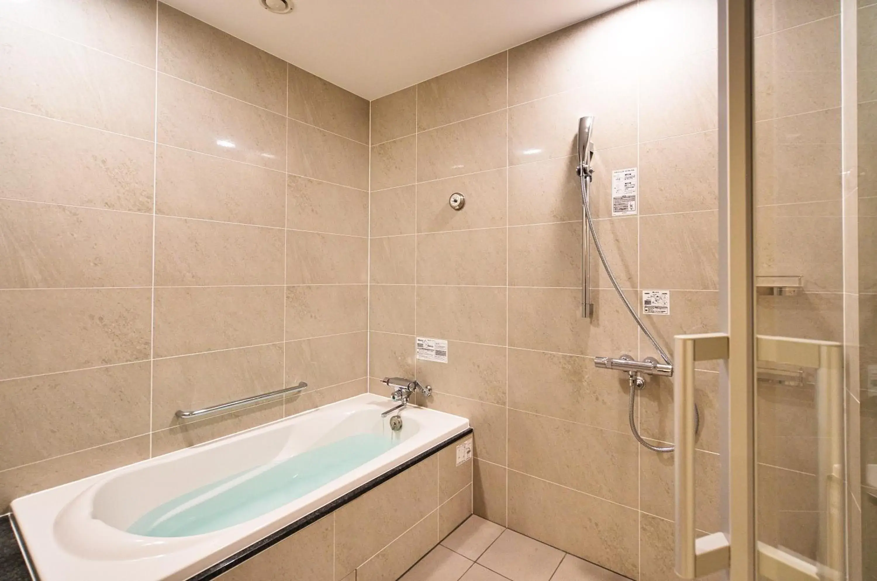 Bathroom in Winery Hotel and Condominium HITOHANA