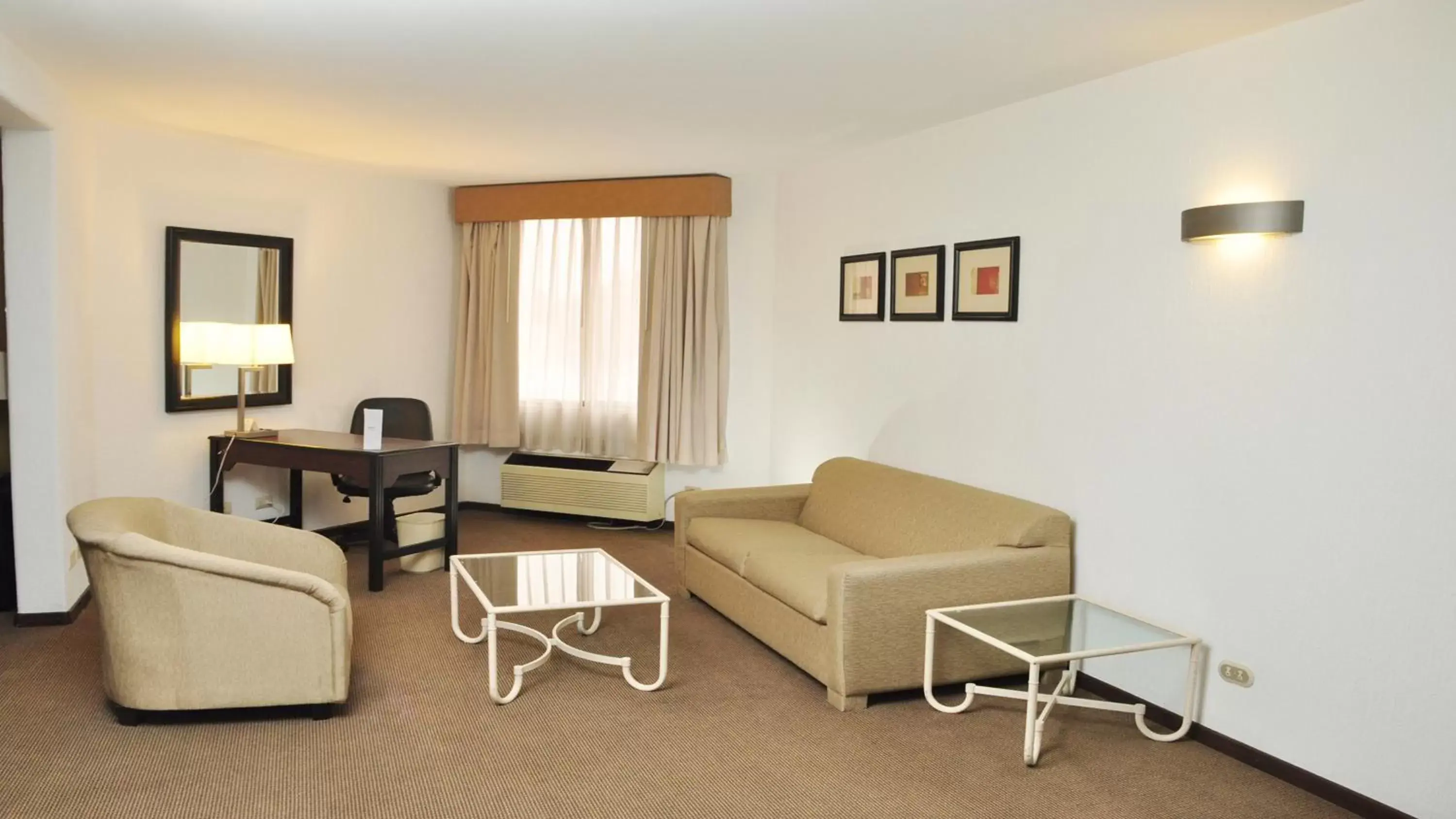 Bedroom, Seating Area in Holiday Inn Tijuana Zona Rio, an IHG Hotel