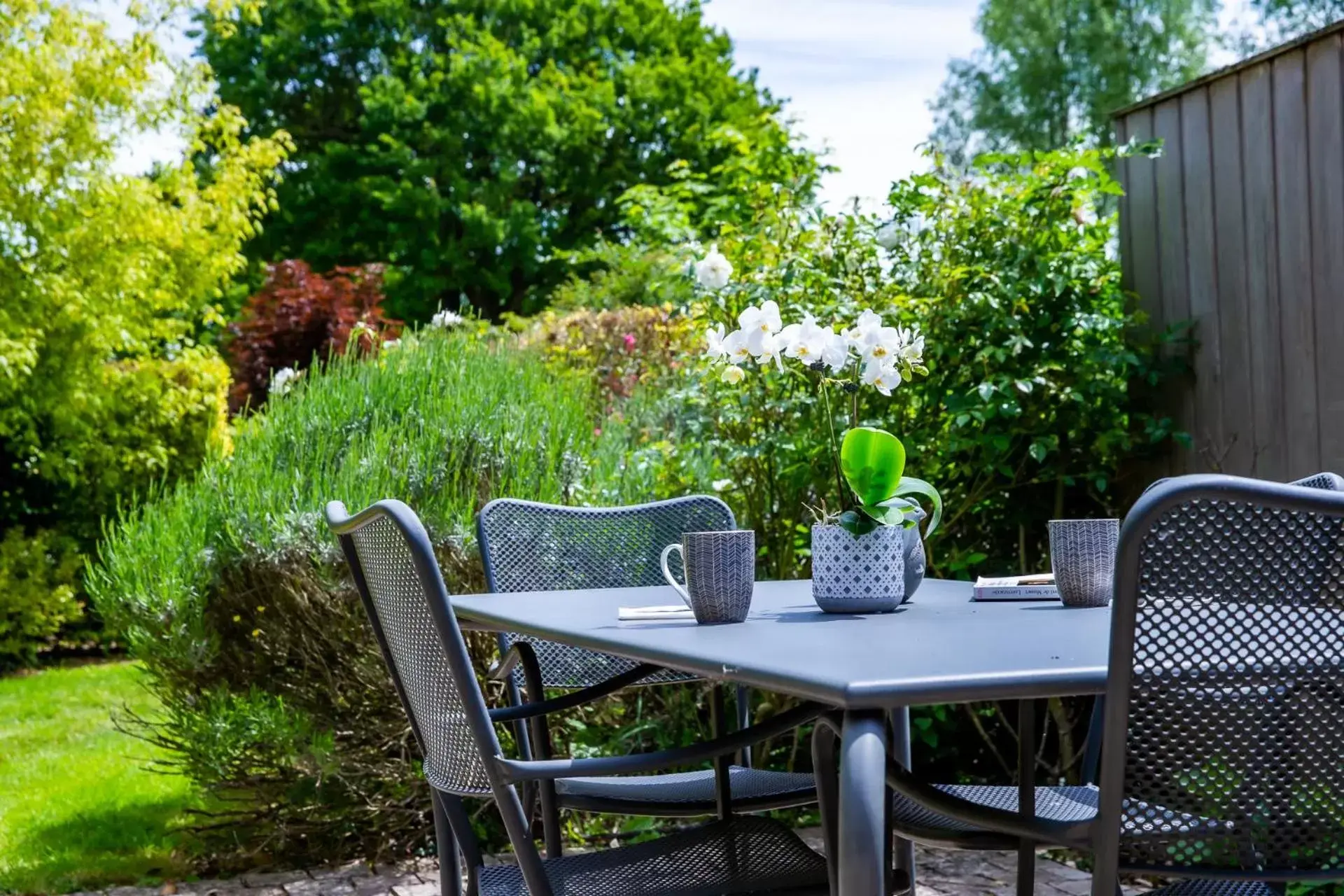 Patio in La Ferme de l'Oudon & SPA