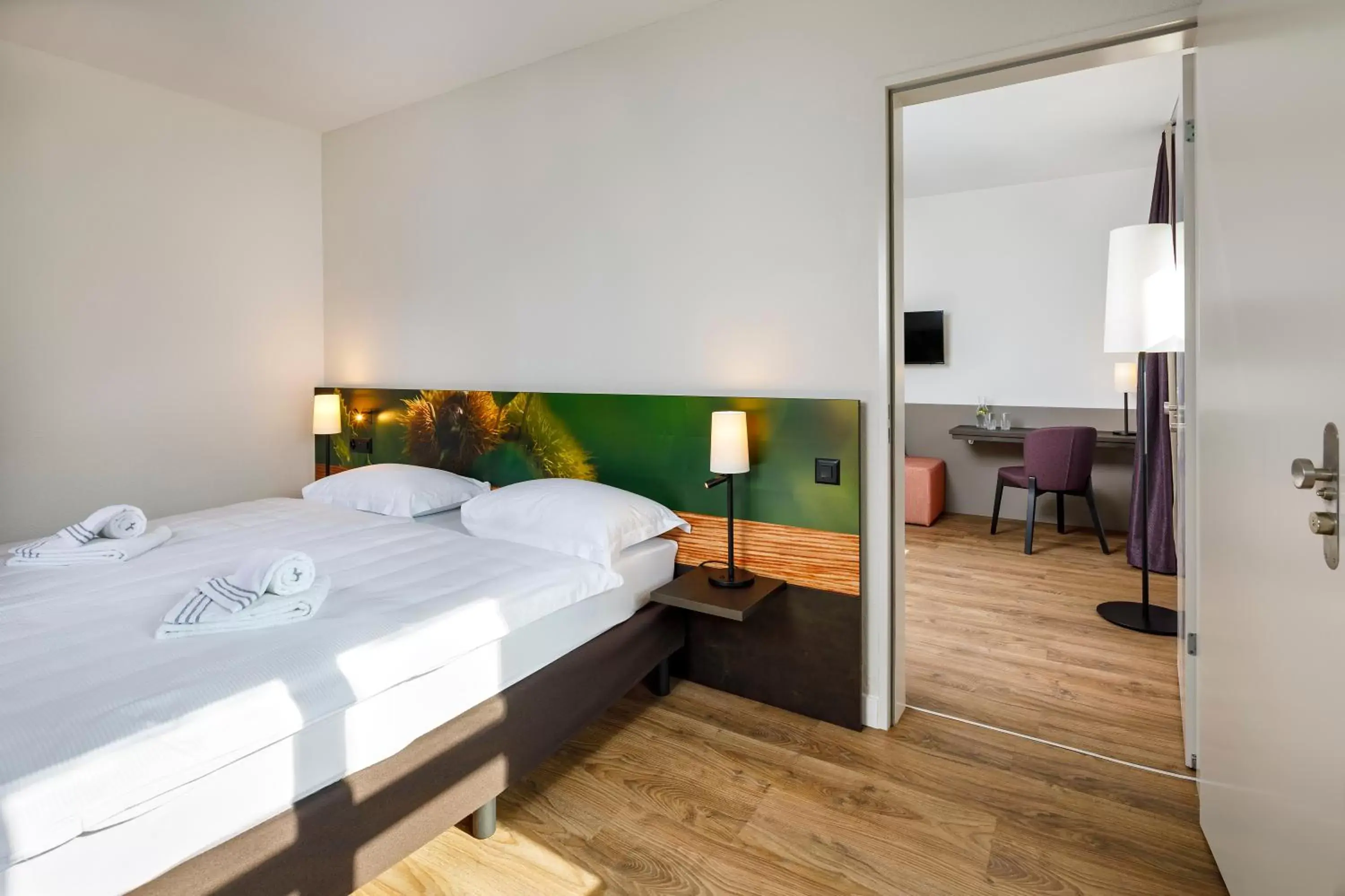 Bedroom, Bed in Hotel Bellinzona Sud Swiss Quality