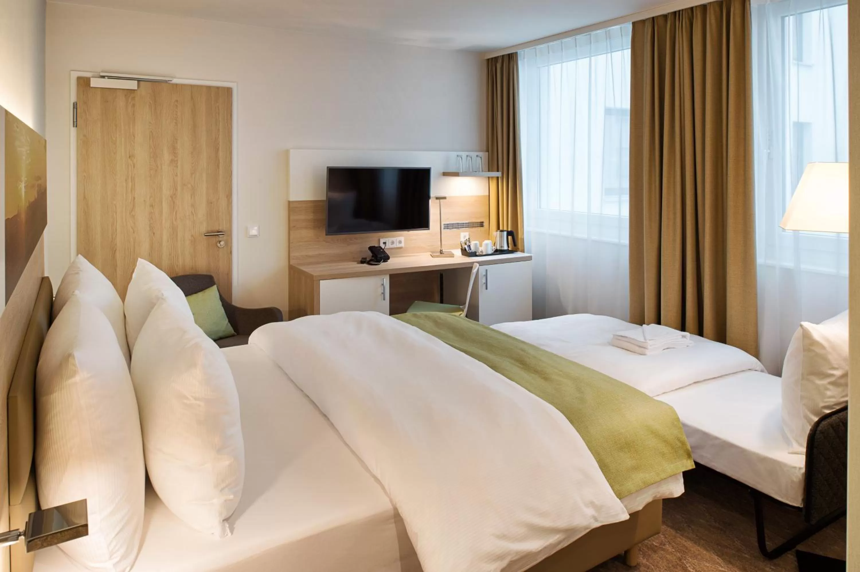 Photo of the whole room, Bed in Holiday Inn Frankfurt Airport by IHG