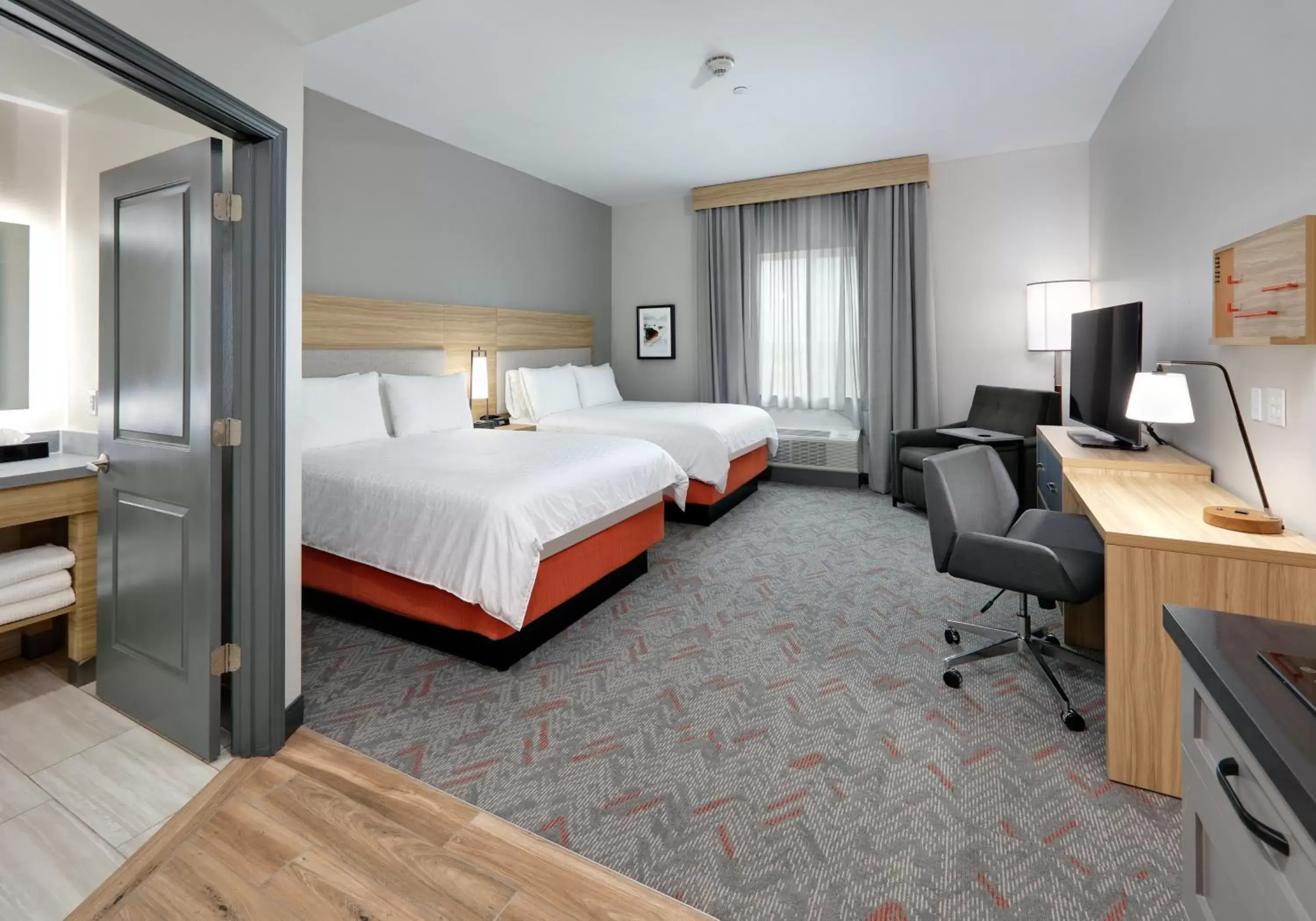 Photo of the whole room, Bed in Candlewood Suites DFW West - Hurst, an IHG Hotel