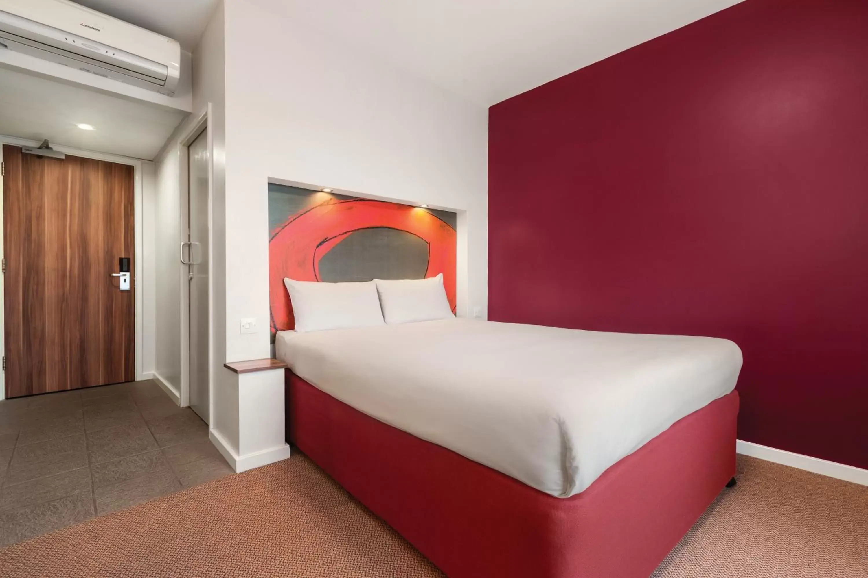 Bed in Ramada London Stansted Airport