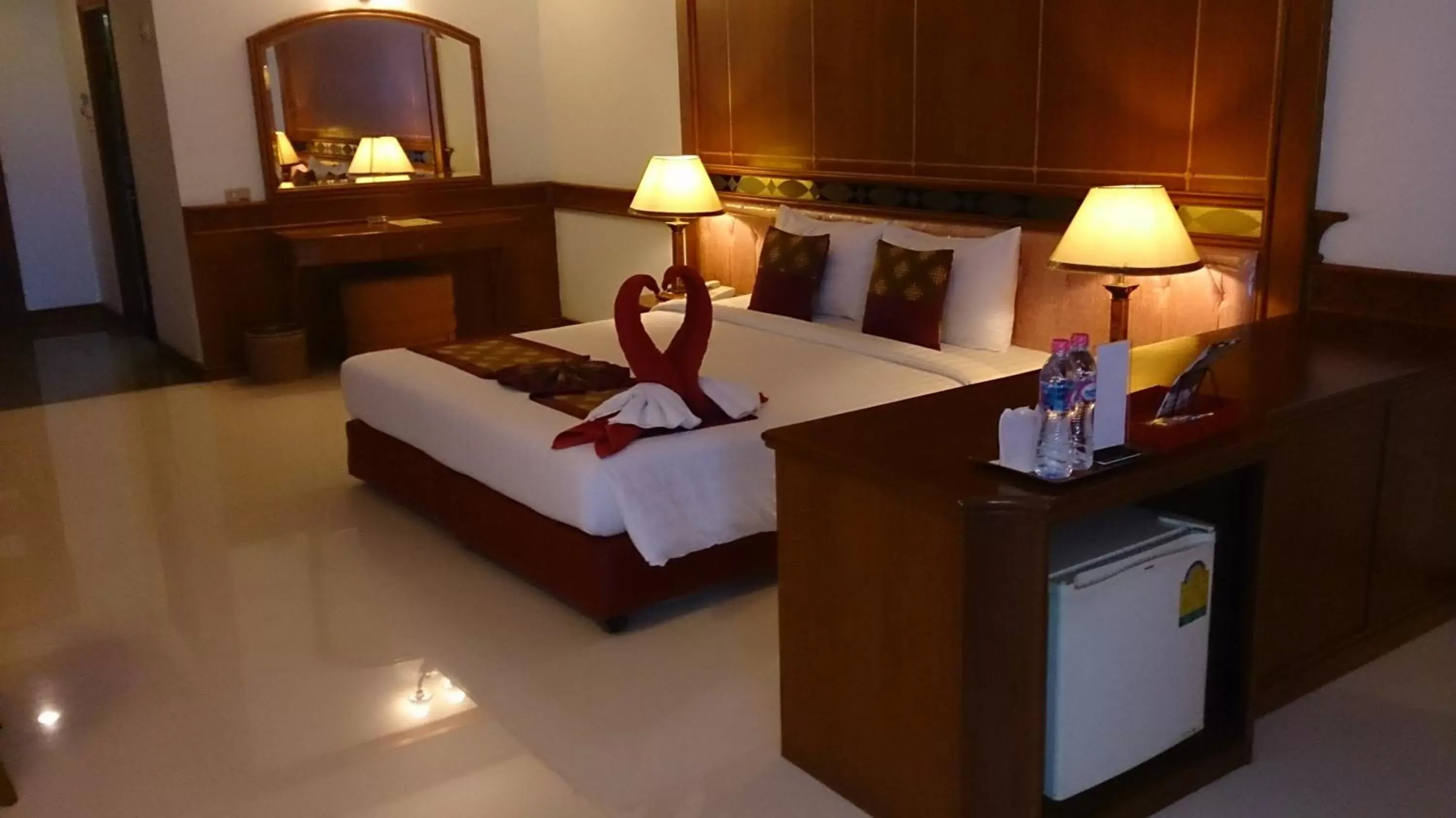 Bed in The Camelot Hotel Pattaya