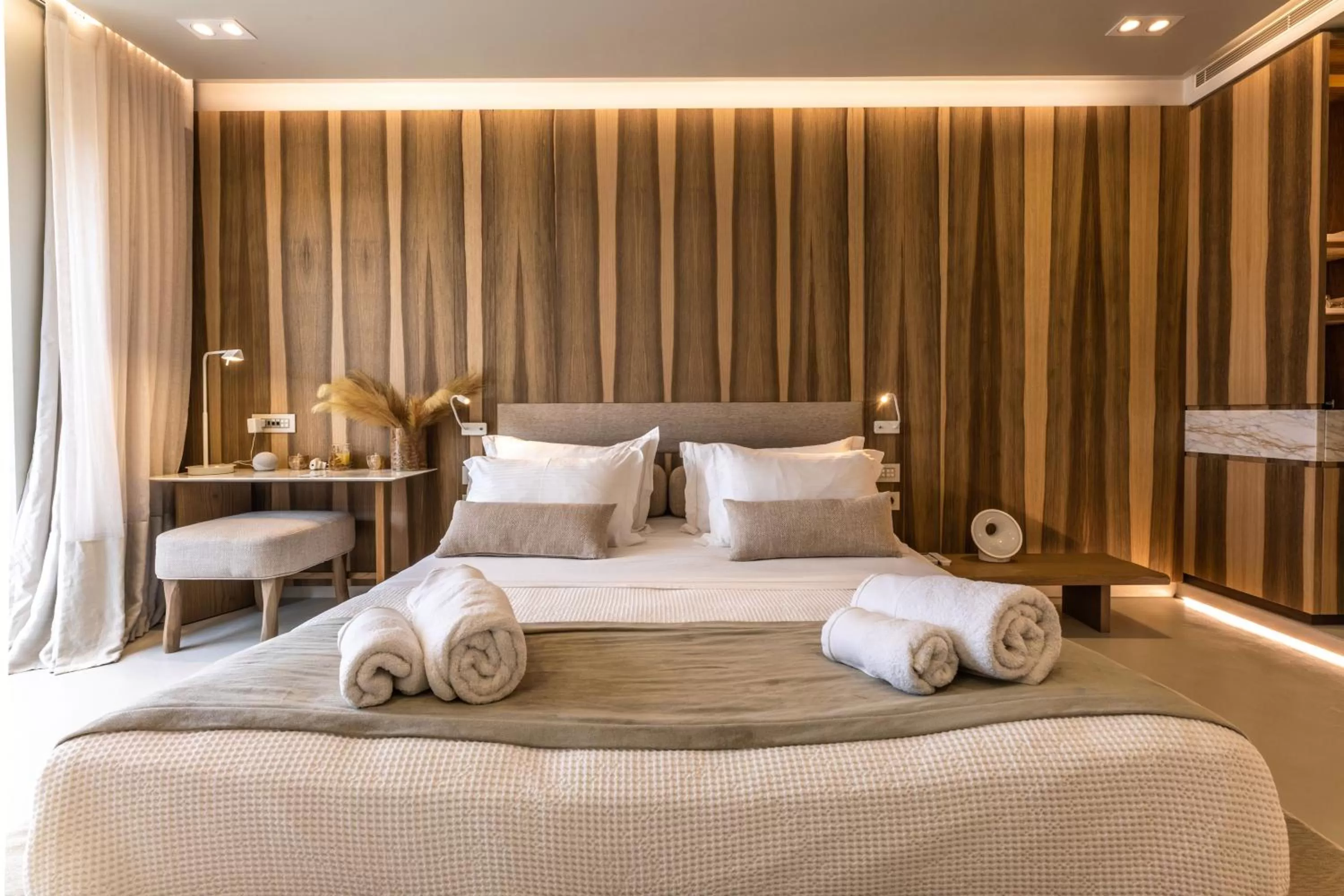 Bed in Avgoustos Suites Naxos