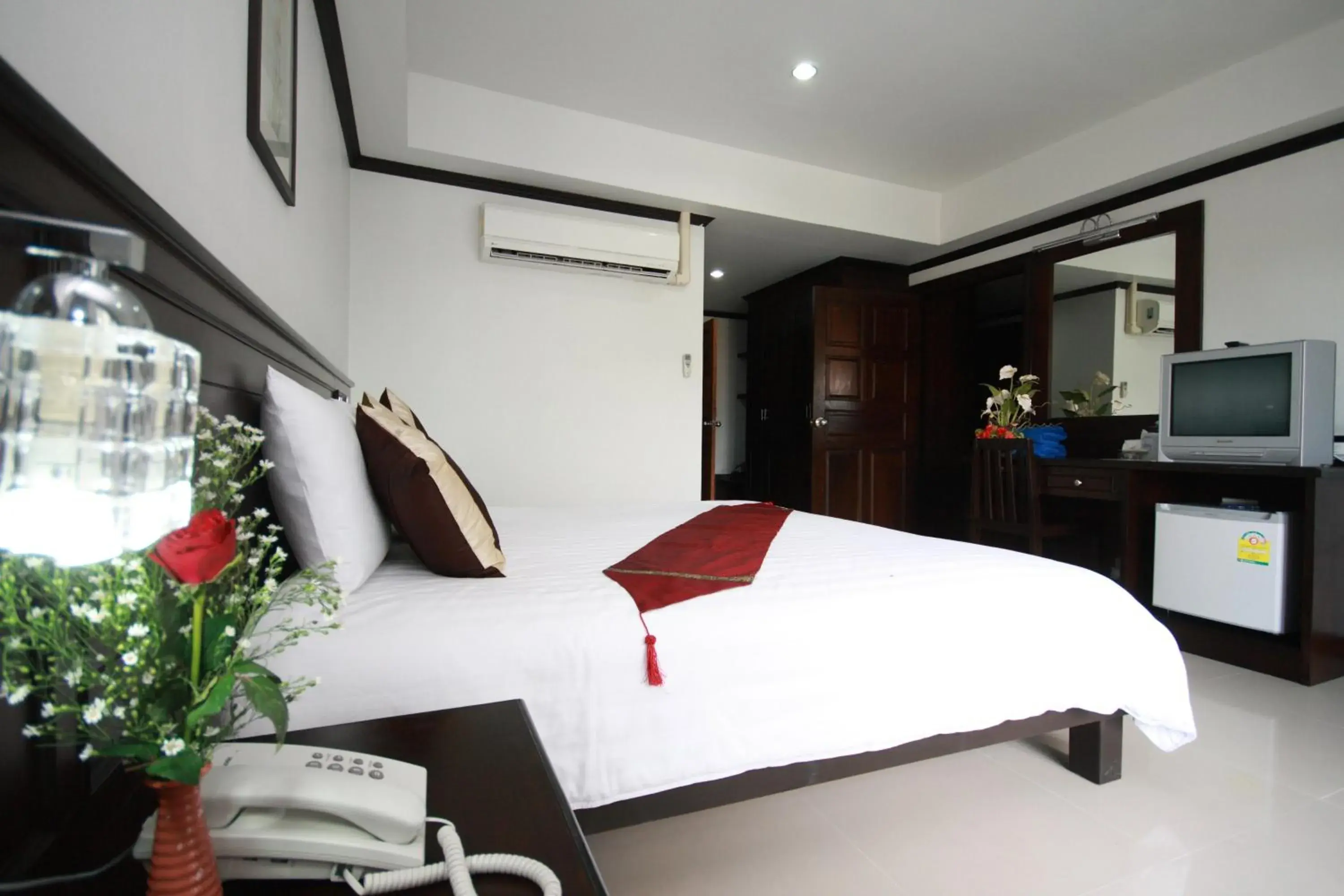 Bed in First Residence Hotel - SHA Plus