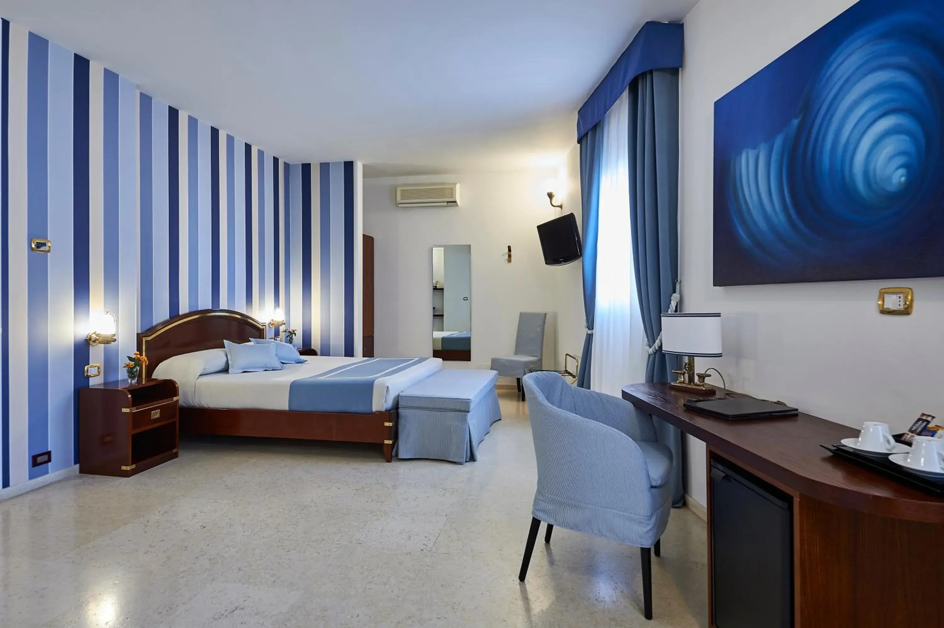 Photo of the whole room in Corte Di Nettuno - CDSHotels