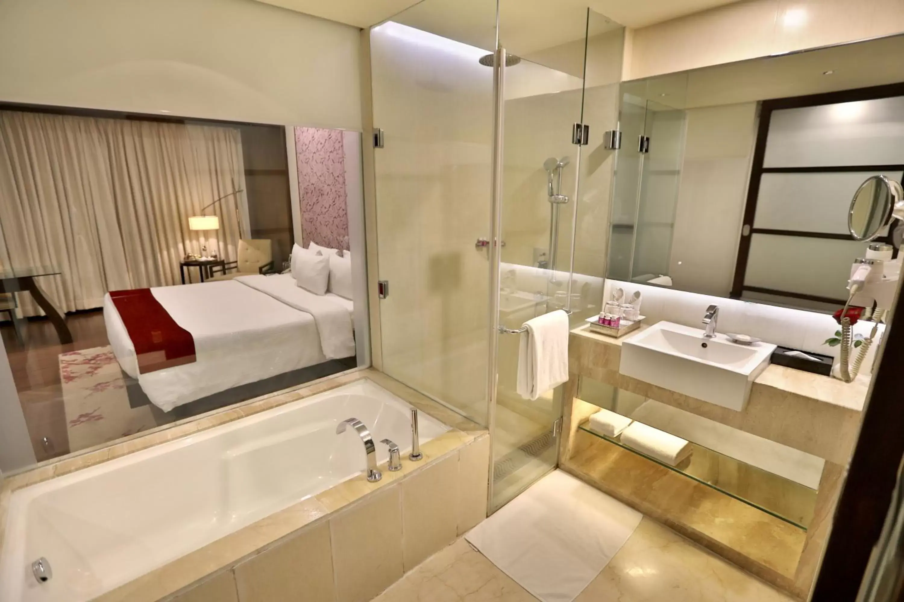 Shower, Bed in Hotel Royal Orchid Jaipur, Tonk Road Shower, Bed in Hotel Royal Orchid Jaipur, Tonk Road