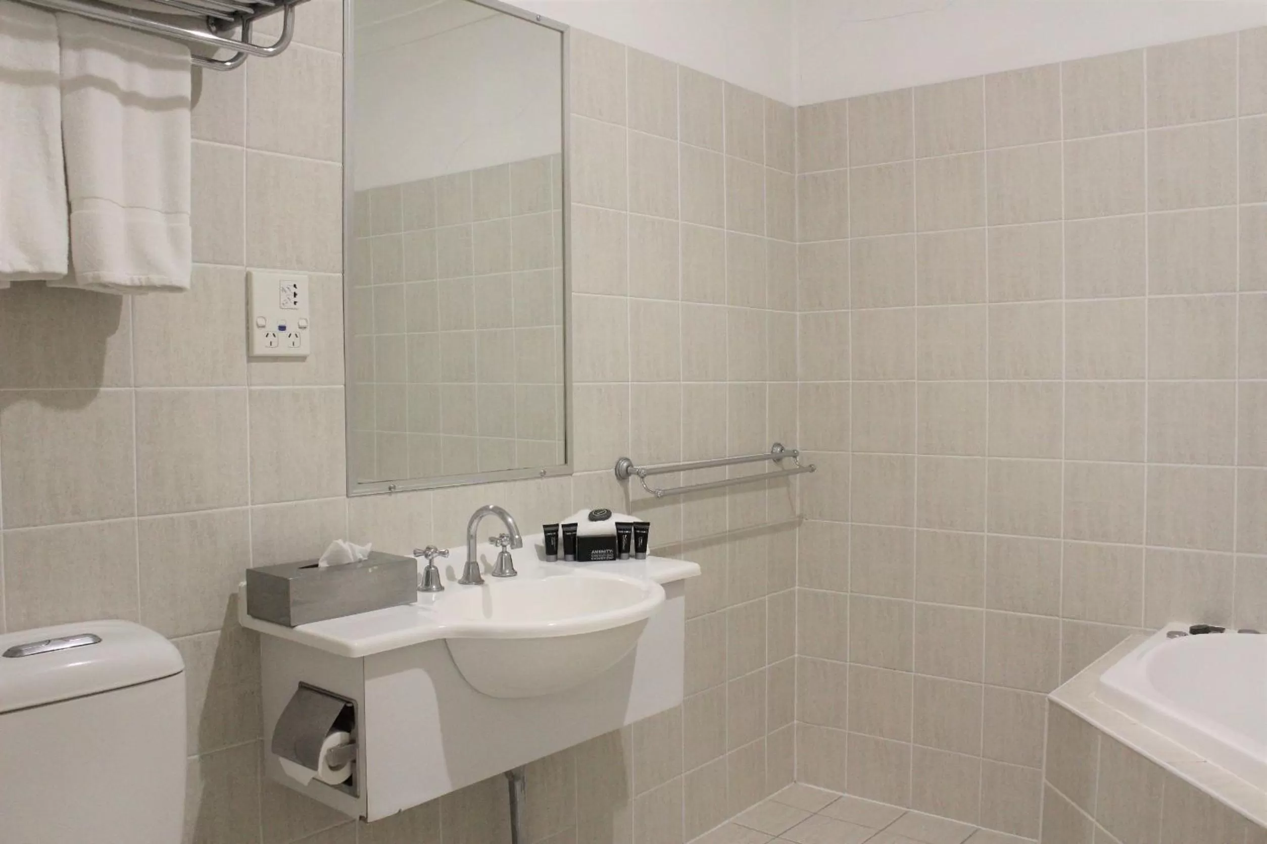Bathroom in Carlyle Suites & Apartments