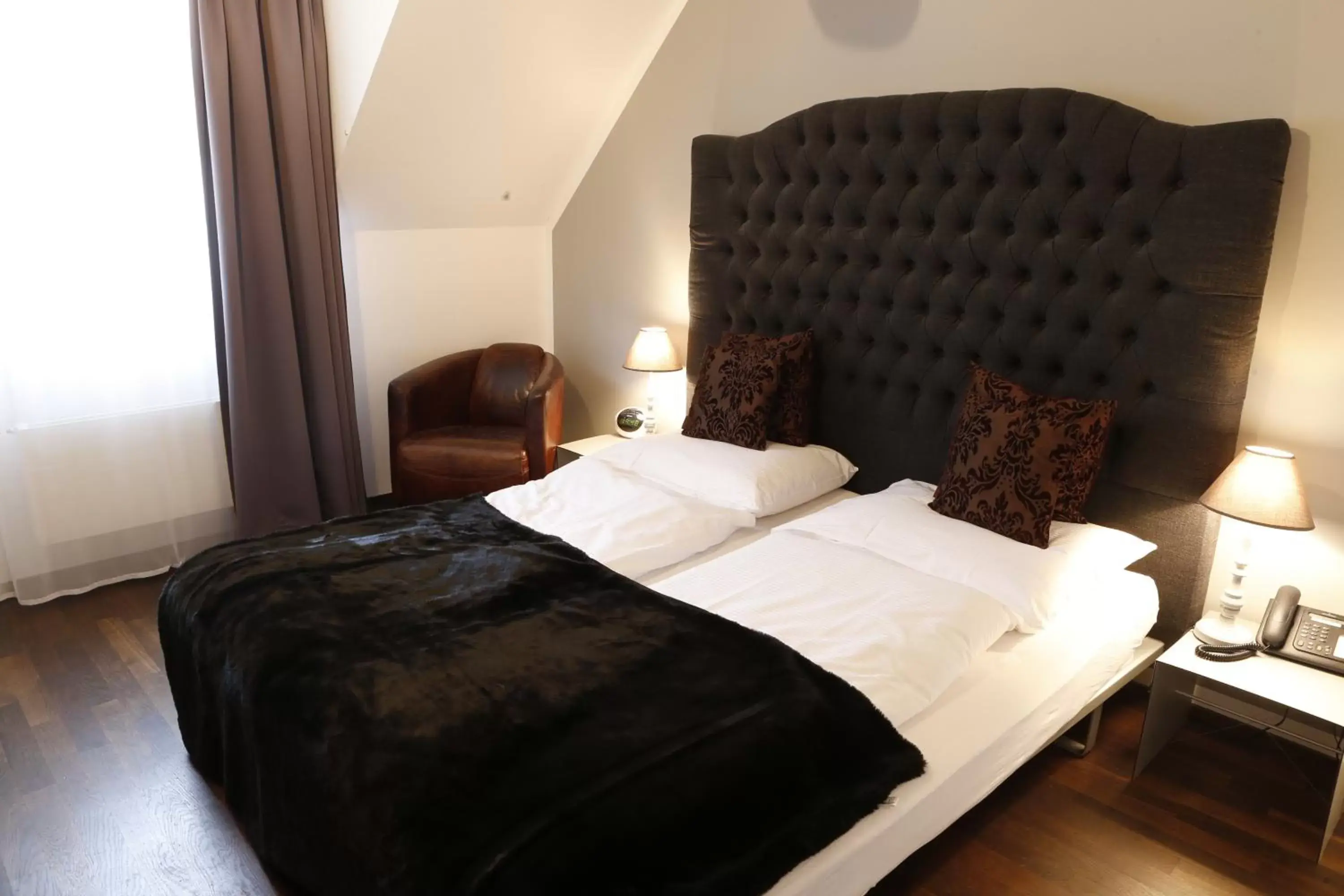 Bed in Boutique Hotel Weisses Kreuz - Adult only Hotel