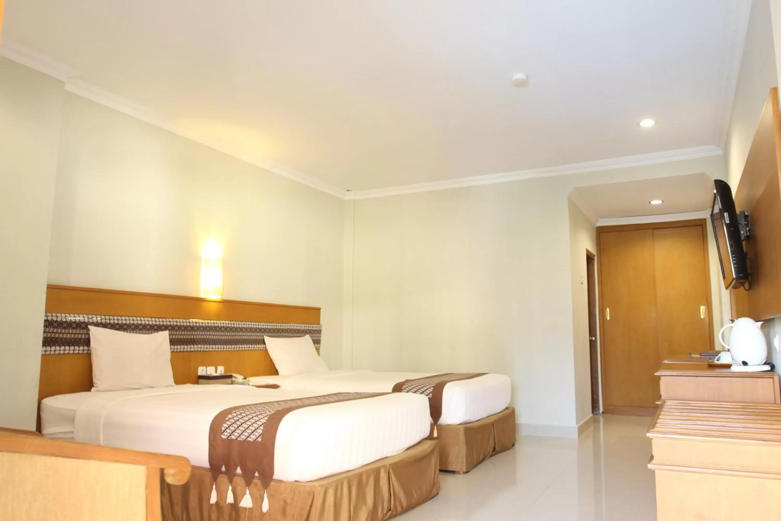 Bedroom, Bed in Cakra Kembang Hotel