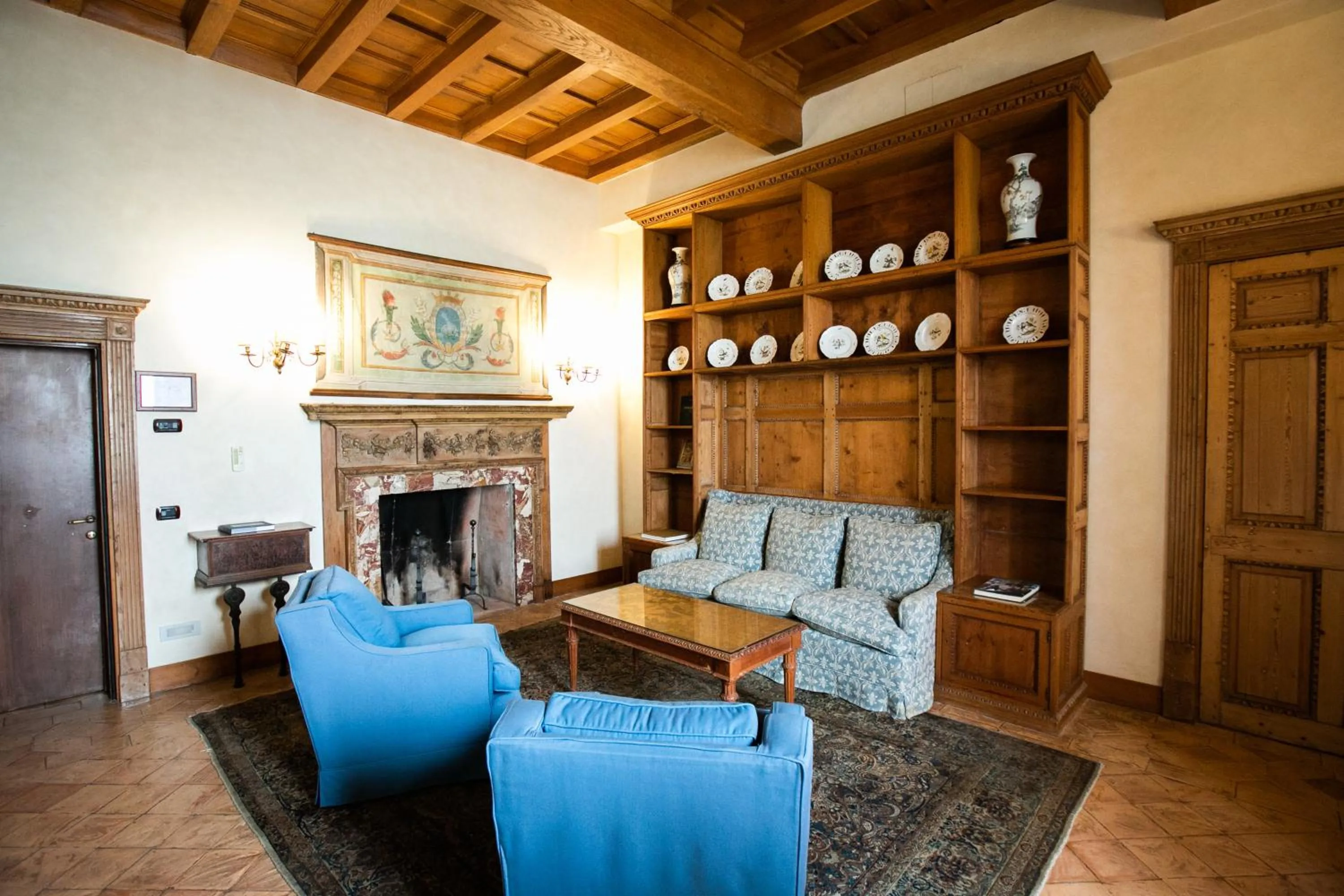 Living room in La Posta Vecchia Hotel