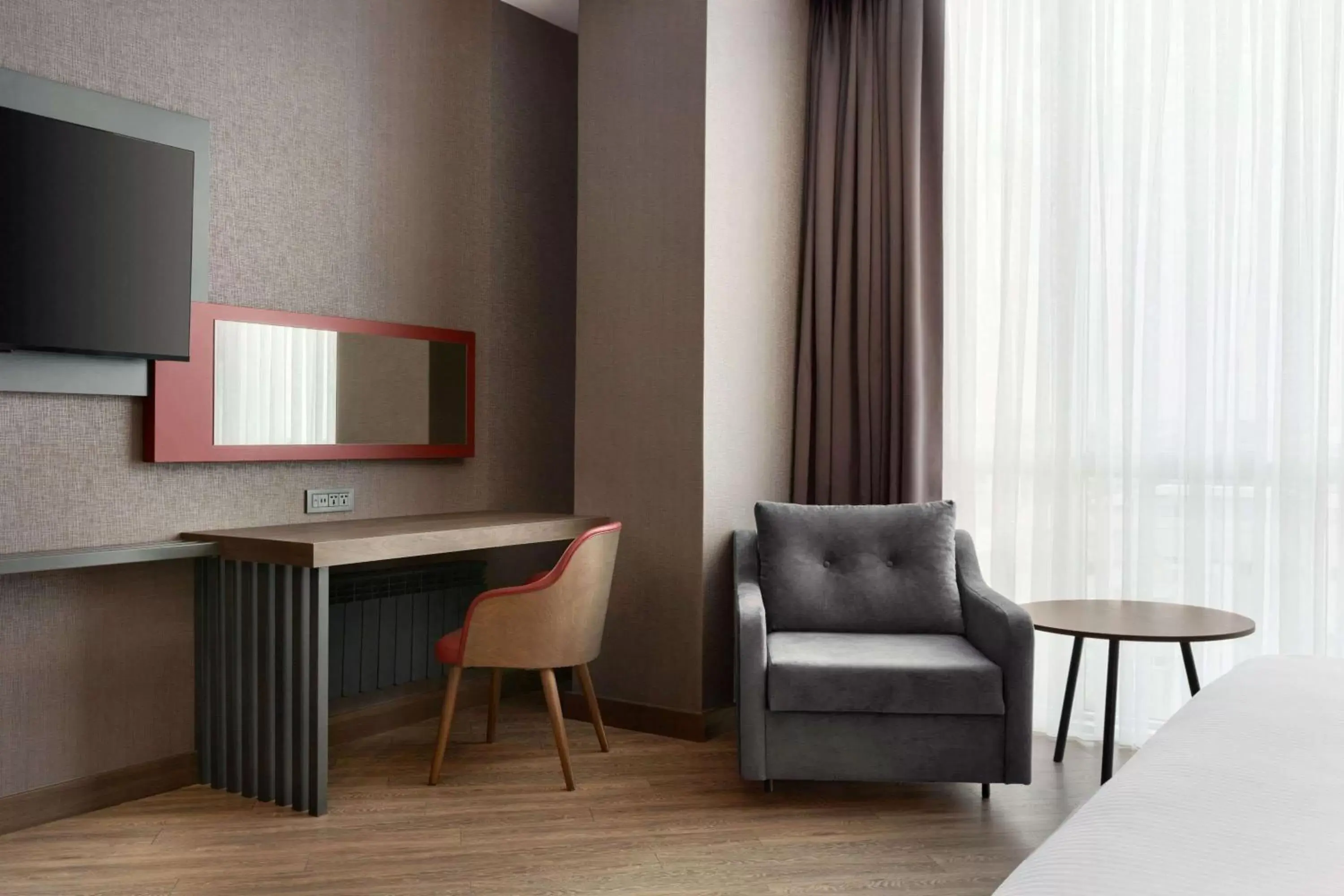 Photo of the whole room, TV/Entertainment Center in Ramada Encore by Wyndham Istanbul Avcilar